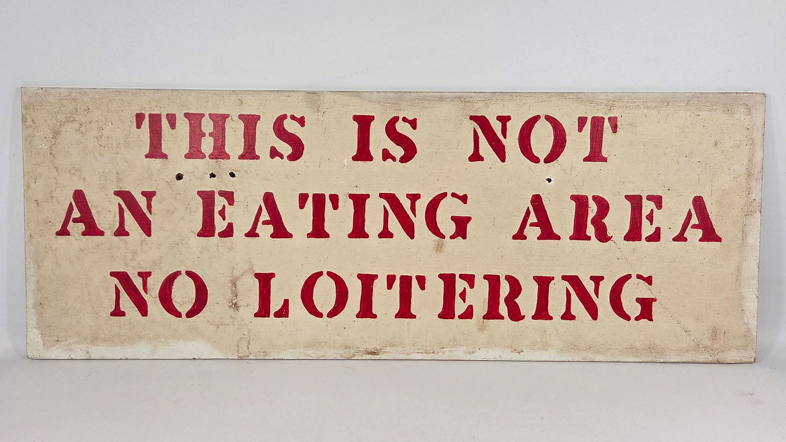HAND PAINTED NO EATING AREA MASONITE SIGN: REMAINS IN FAIR TO GOOD CONDITION, SHOWING TYPICAL WEAR.