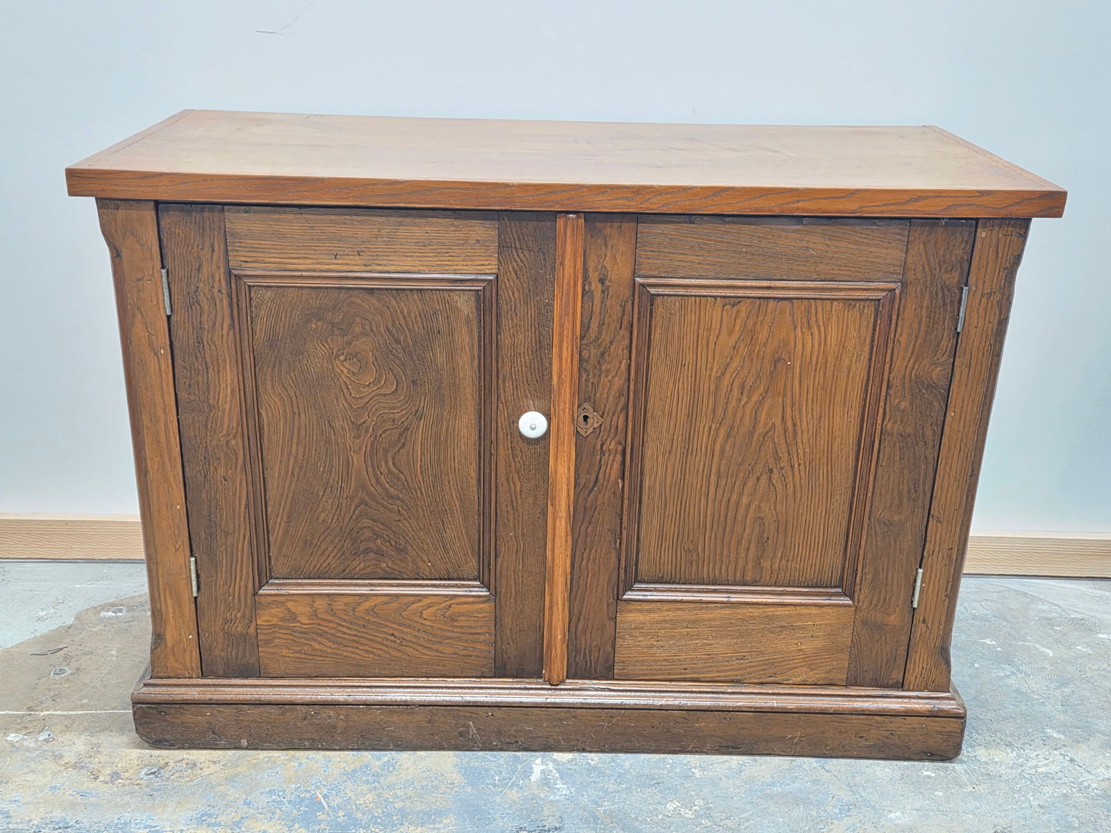 ANTIQUE OAK SECRETARY DESK BASE W/ CUSTOM TOP: REMAINS IN FAIR TO GOOD USED CONDITION, SHOWING TYPICAL WEAR. CUSTOM TOP MADE. **PLEASE NOTE** THIS ITEM IS NOT AVAILABLE FOR SHIPPING. LOCAL PICKUP ONLY PLEASE.