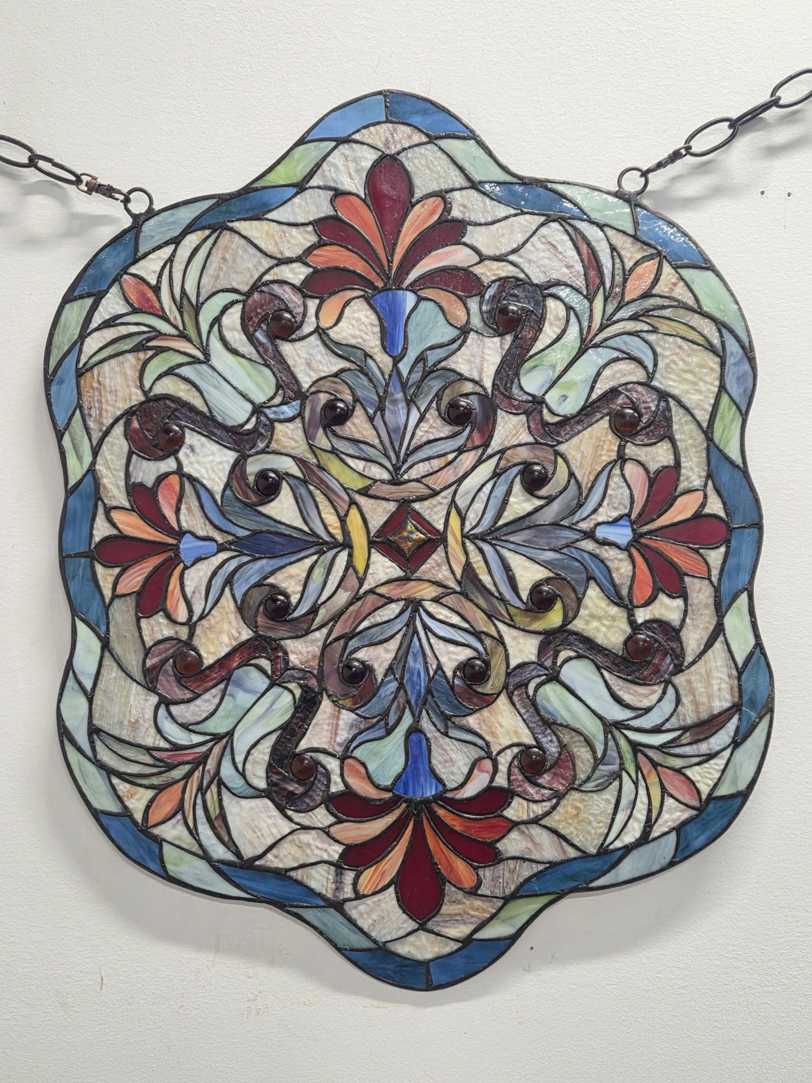 LEADED STAINED GLASS WINDOW PANEL: REMAINS IN GOOD CONDITION, SHOWING SOME TYPICAL WEAR.