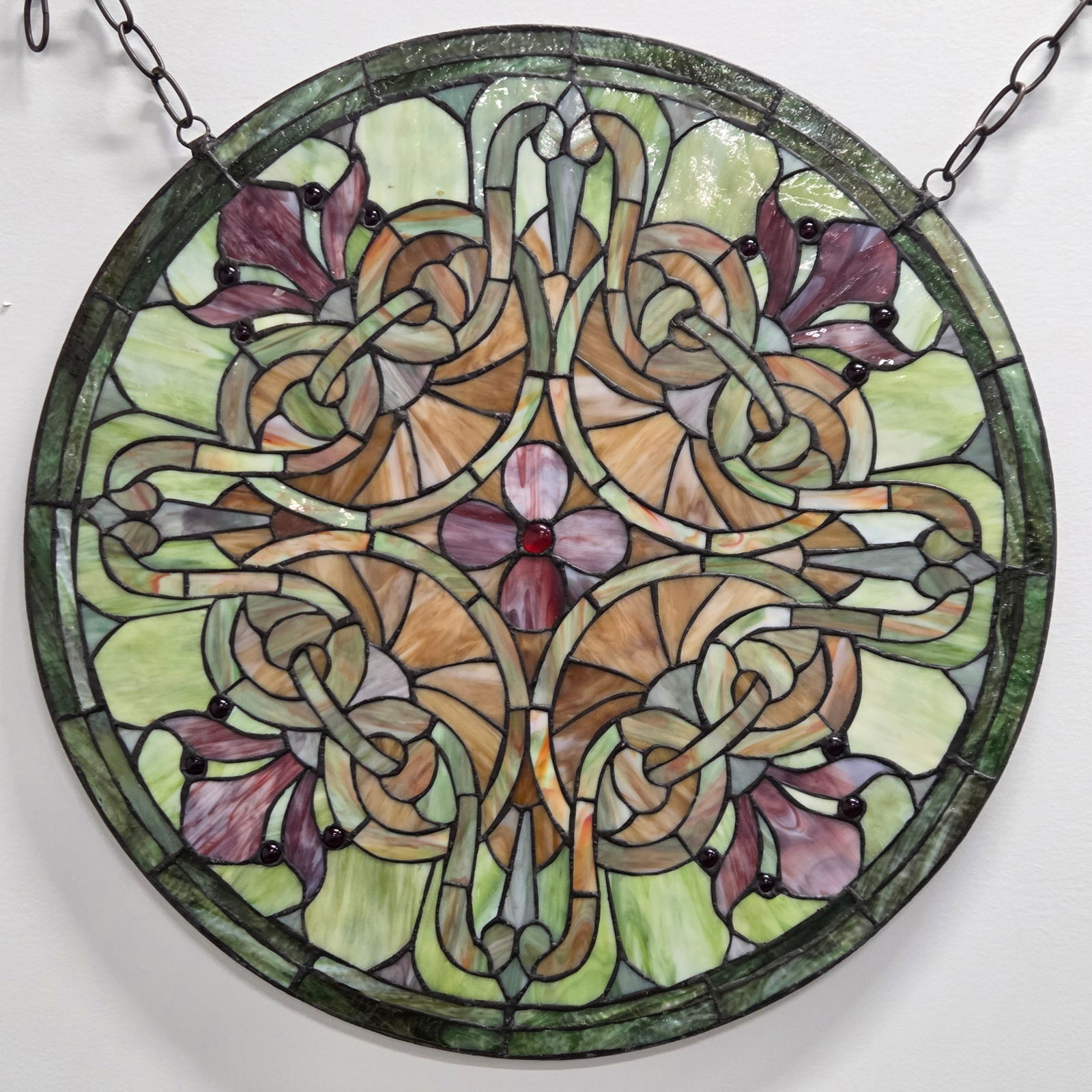 ROUND LEADED STAINED GLASS WINDOW PANEL: REMAINS IN GOOD CONDITION, SHOWING SOME TYPICAL WEAR.