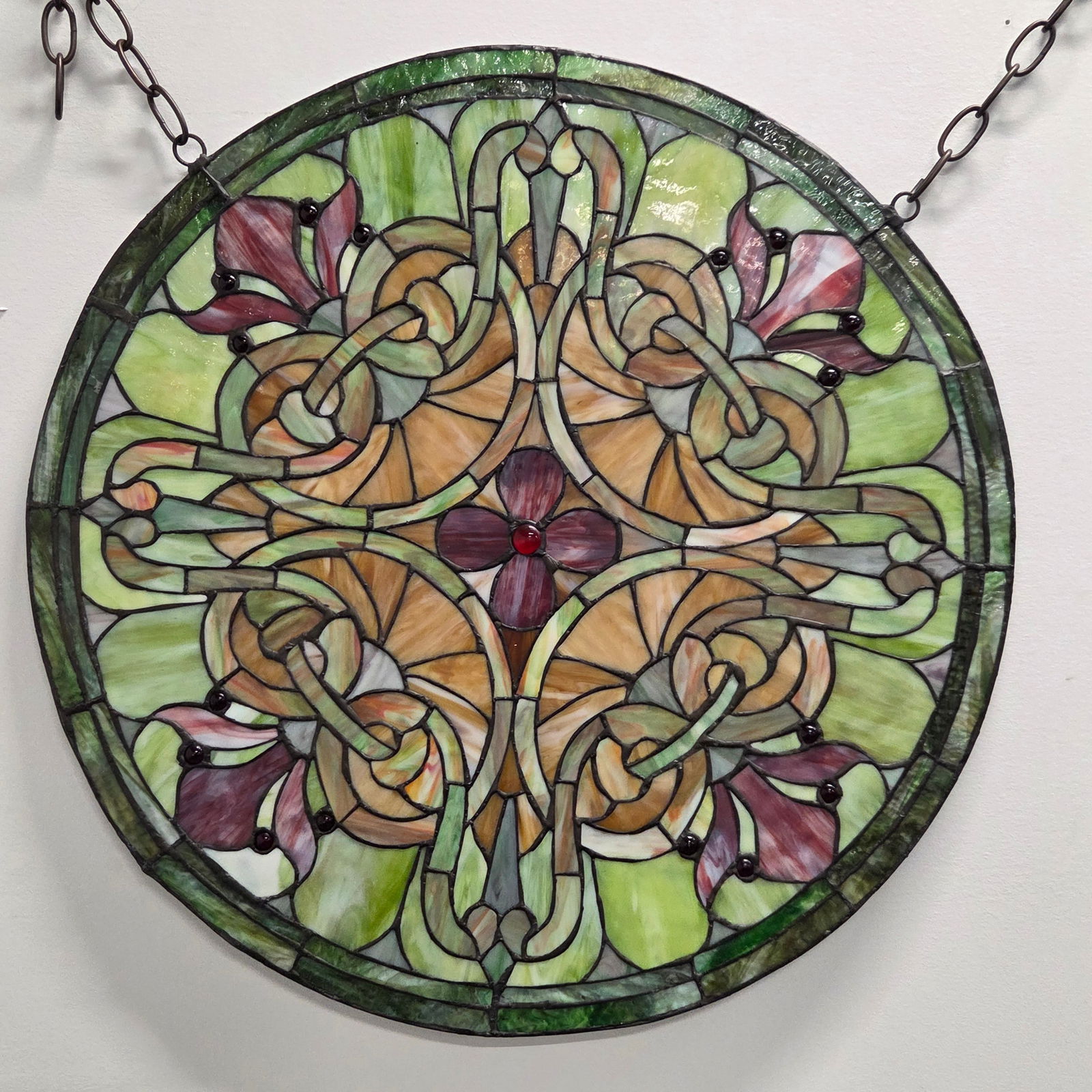 ROUND LEADED STAINED GLASS WINDOW PANEL: REMAINS IN GOOD CONDITION, SHOWING SOME TYPICAL WEAR.