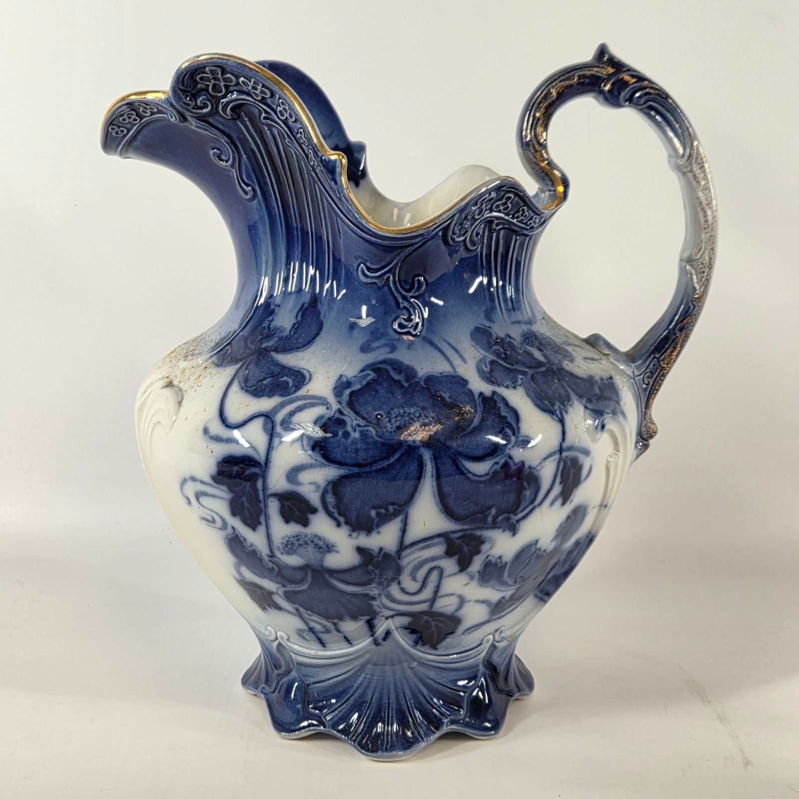 REPRODUCTION COBALT BLUE & WHITE CERAMIC PITCHER: REMAINS IN GOOD CONDITION, NEEDS CLEANED. NO CHIPS OR CRACKS.