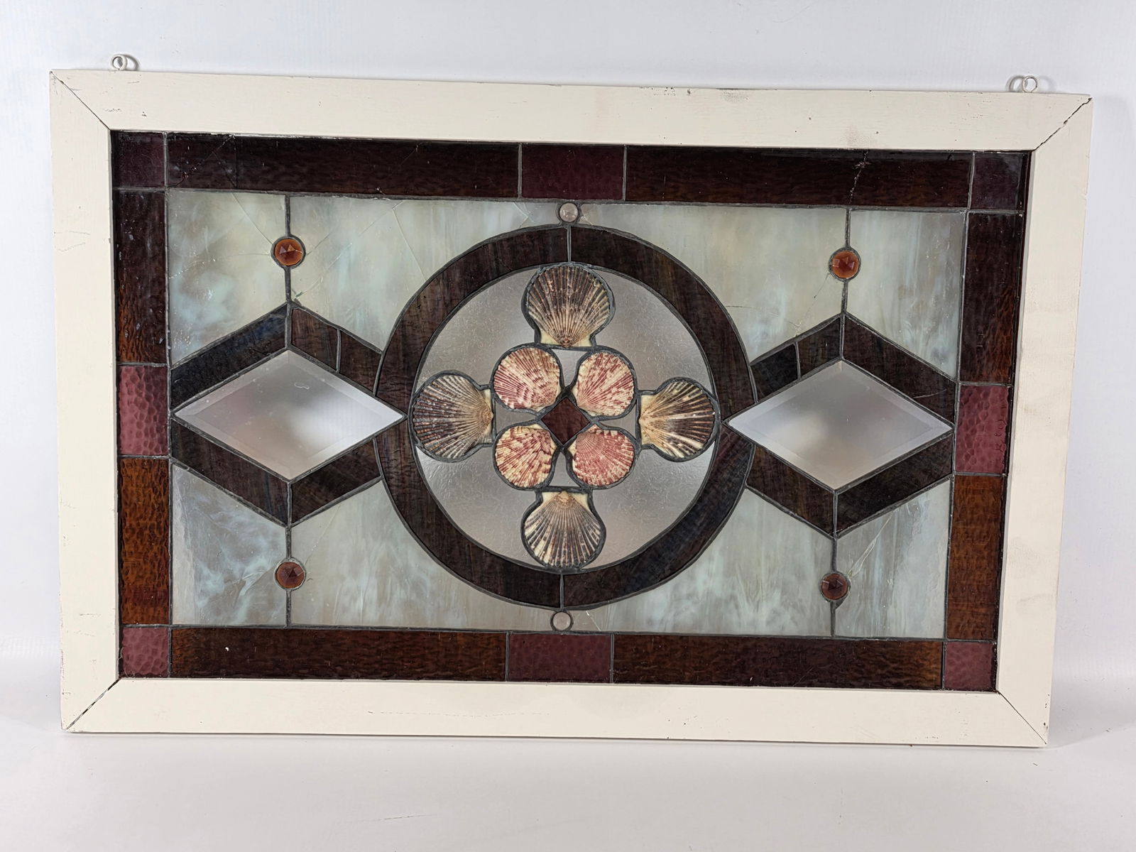 VINTAGE LEADED STAINED GLASS & SEA SHELL WINDOW PANEL: REMAINS IN GOOD CONDITION. SHOWS A FEW PANELS WITH SOME CRACKS.