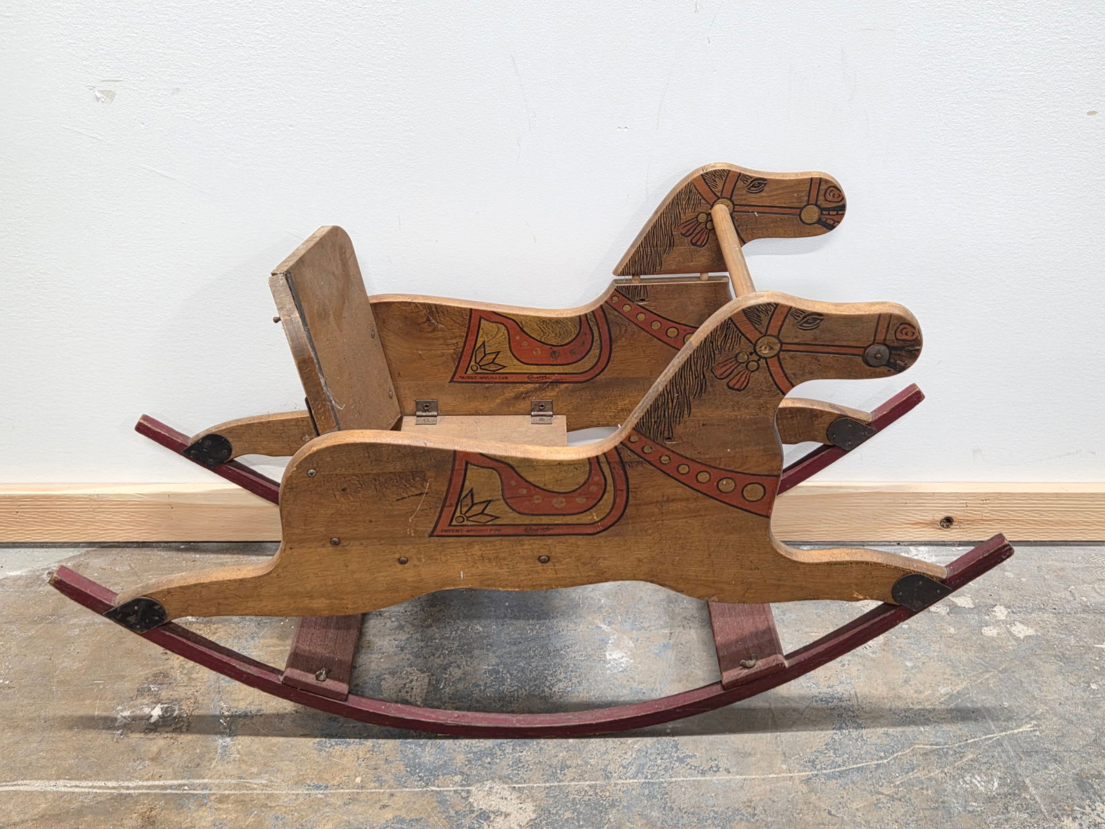 ANTIQUE CONVERSE WOOD CHILDS ROCKING HORSE: REMAINS IN GOOD CONDITION, SHOWING SOME TYPICAL USAGE WEAR.