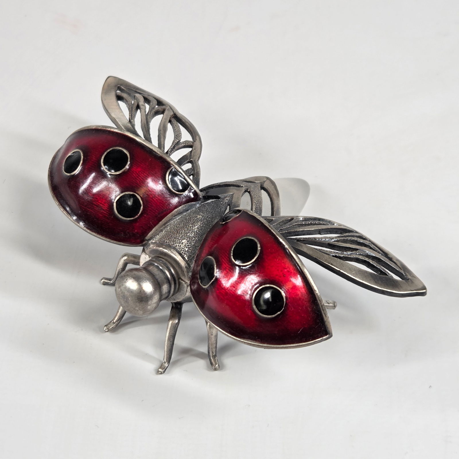 ENAMELED METAL LADYBUG PERFUME HOLDER: REMAINS IN VERY GOOD CONDITION. UNMARKED.