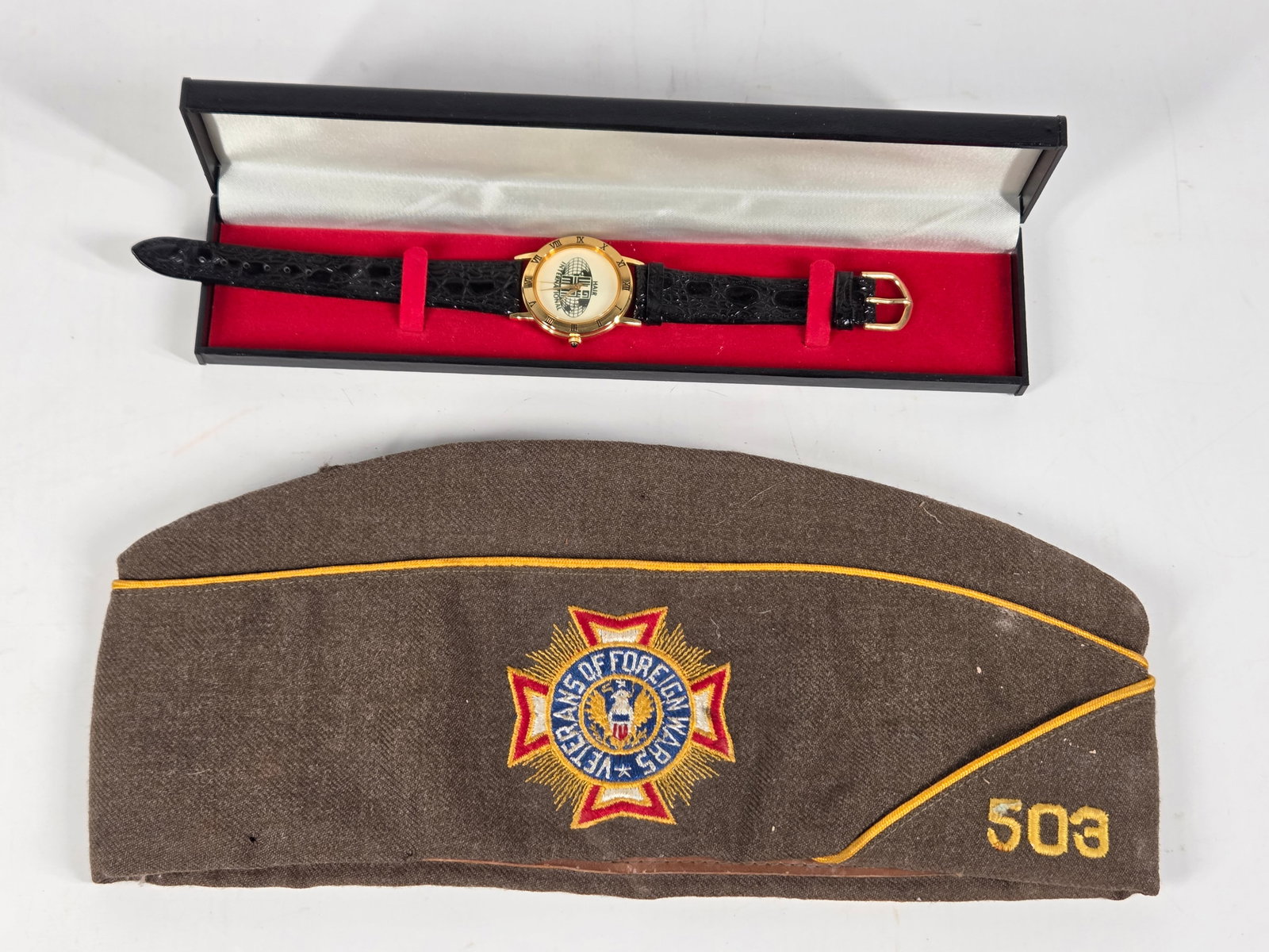 VFW HAT & HAIR INTERNATIONAL WATCH: WATCH REMAINS IN EXCELLENT UNUSED CONDITION. HAT REMAINS NICE, SHOWING SOME WEAR.