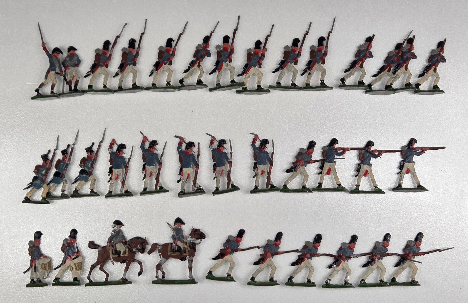 LARGE ASSORTMENT OF MINIATURE HAND PAINTED SOLDIERS: ALL REMAIN IN FAIR TO GOOD CONDITION, SHOWING PAINT WEAR AND SOME BENDS.