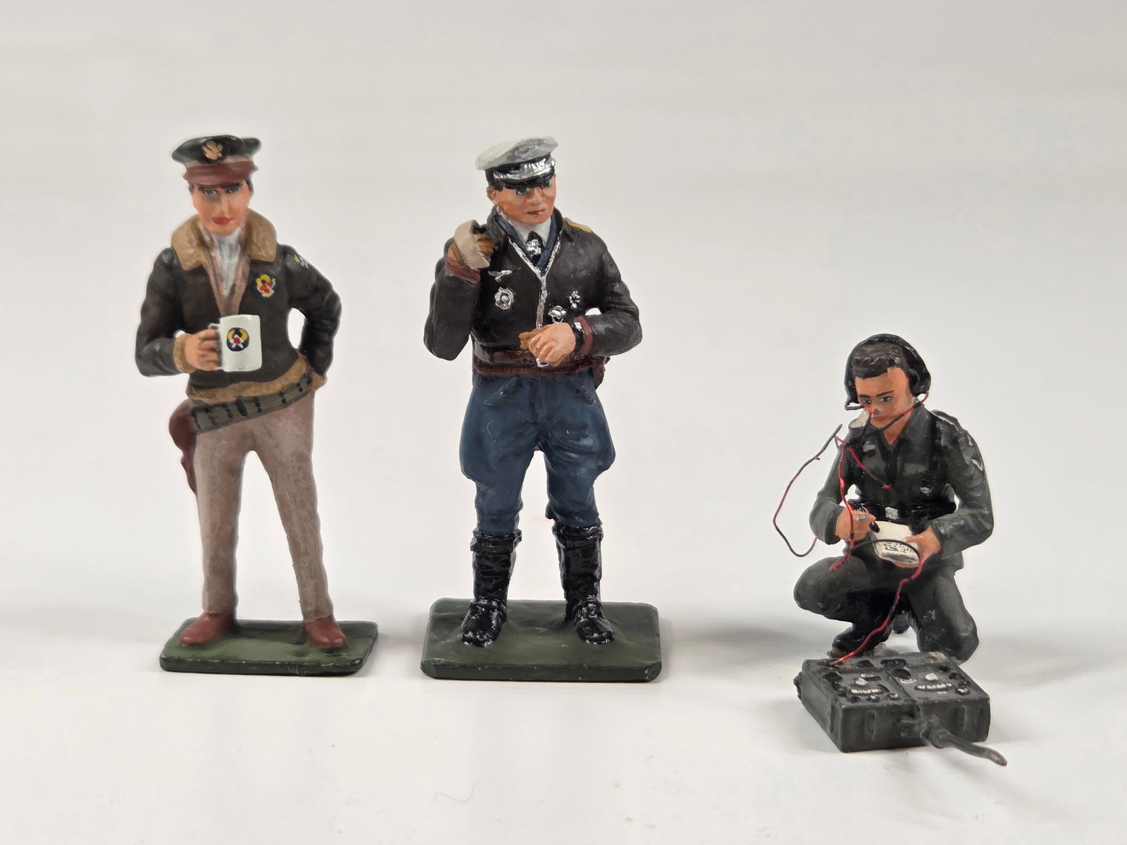 3) HAND PAINTED LEAD SOLDIERS: ALL REMAIN IN GOOD CONDITION, SHOWING SOME LIGHT WEAR.