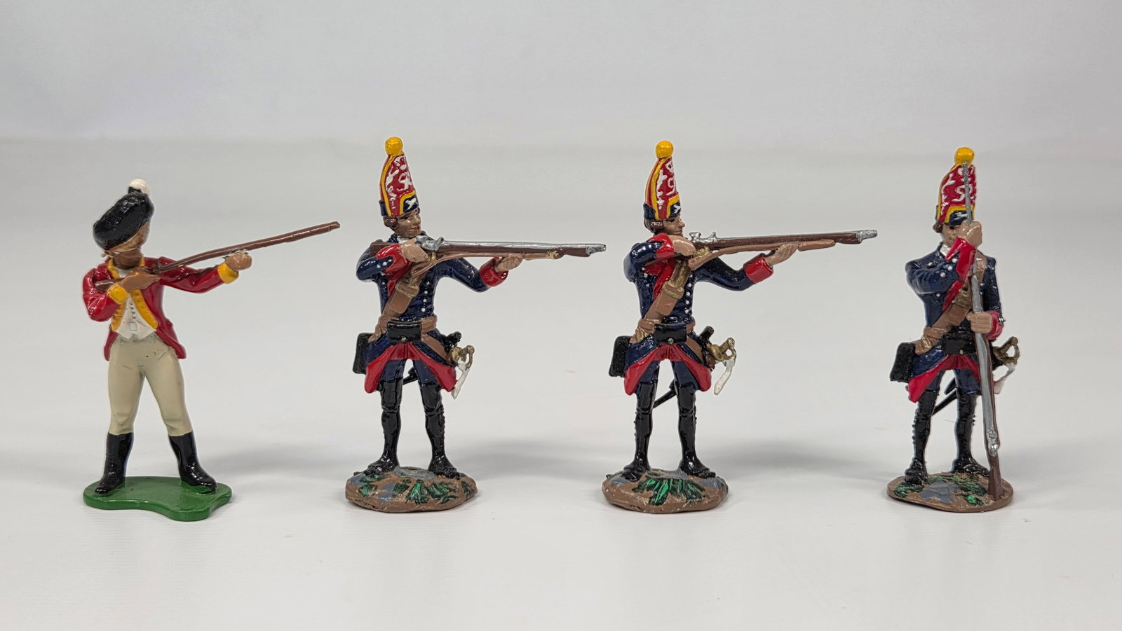 BRITAINS & 3) HAND PAINTED REVOLUTIONARY WAR SOLDIERS: ALL REMAIN IN GOOD CONDITION.