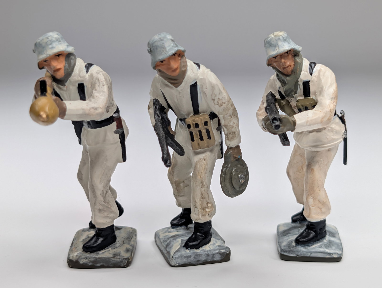 SET OF 3 HAND PAINTED "RK" LEAD SOLDIERS: ALL REMAIN IN GOOD CONDITION.