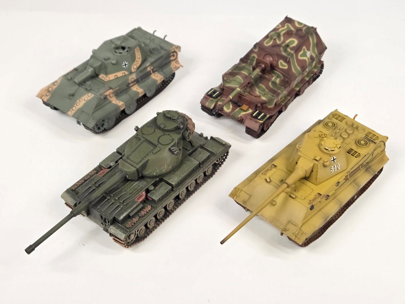 VARIOUS BRAND PLASTIC MILITARY TANKS: ALL REMAIN IN FAIR TO GOOD CONDITION, SHOWING SOME TYPICAL DISPLAY WEAR.
