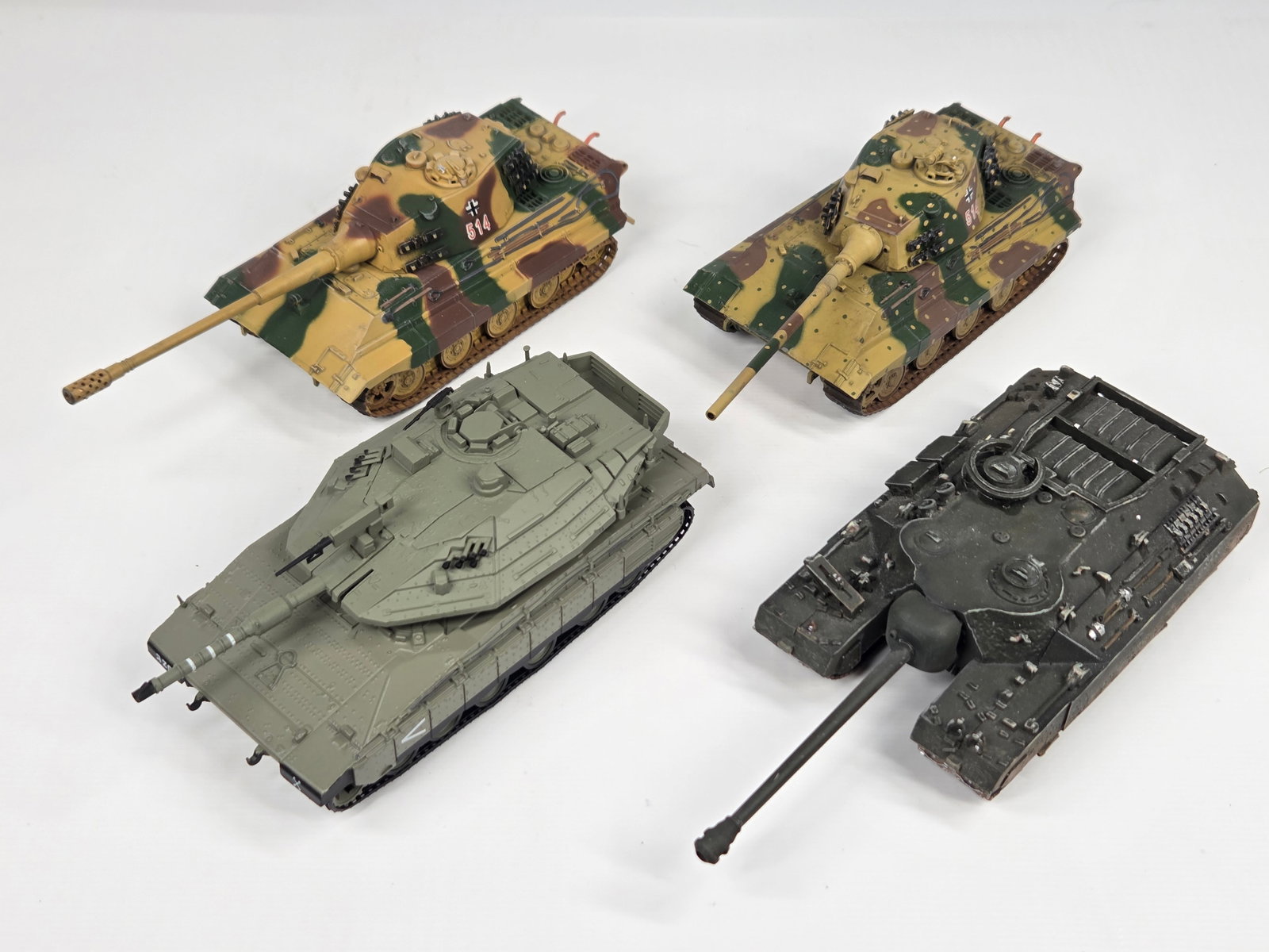 VARIOUS BRAND PLASTIC MILITARY TANKS: ALL REMAIN IN FAIR TO GOOD CONDITION, SHOWING SOME TYPICAL DISPLAY WEAR.