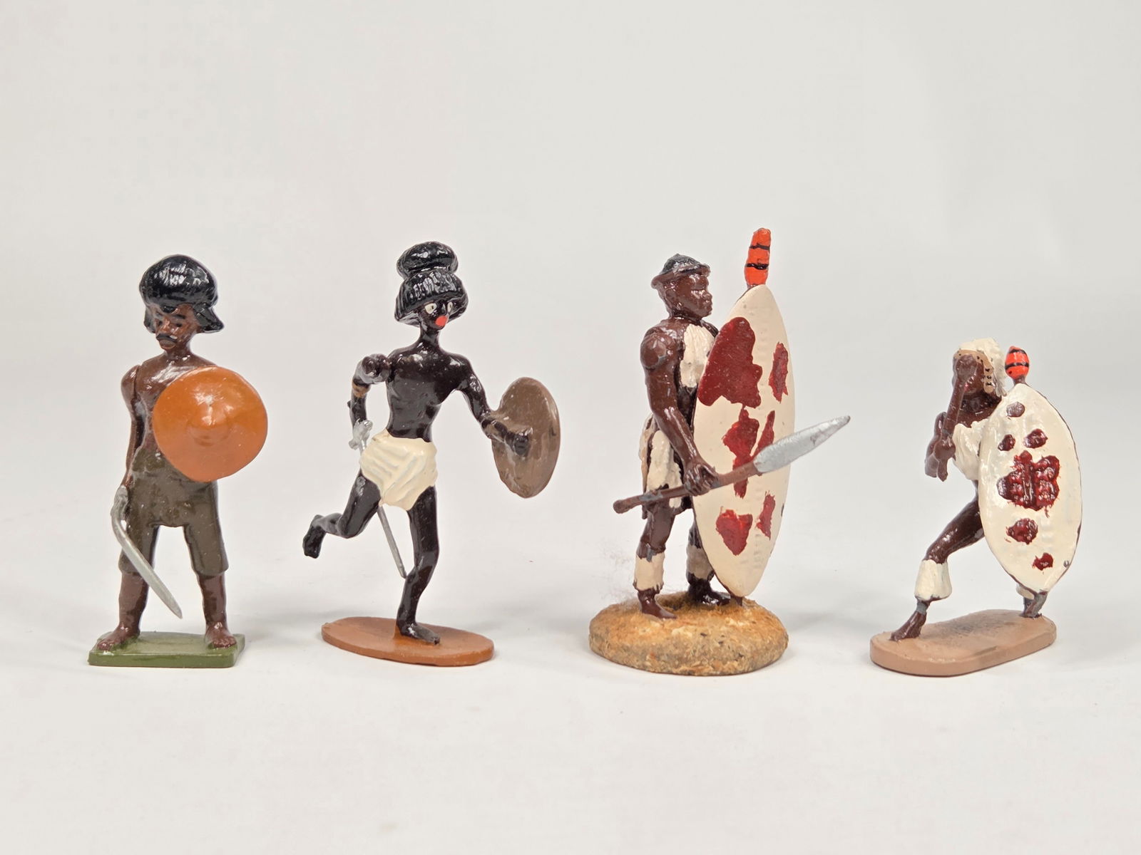VARIOUS BRAND LEAD HAND PAINTED ZULU WARRIORS: ALL REMAIN IN GOOD CONDITION, SHOWING SOME TYPICAL WEAR.