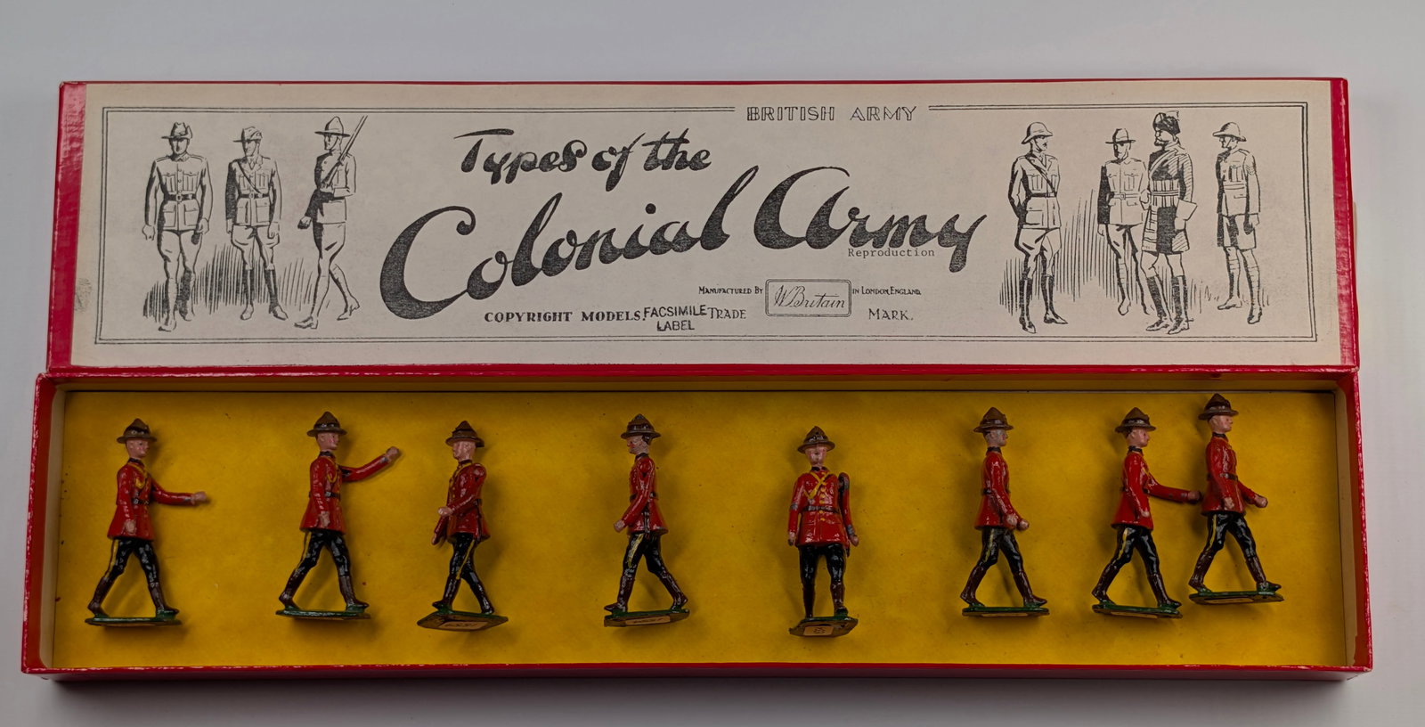 VINTAGE BRITAIN ROYAL CANADIAN MOUNTED POLICE: SET REMAINS IN VERY GOOD CONDITION, SHOWING SOME TYPICAL WEAR. BOX REPRODUCTION.
