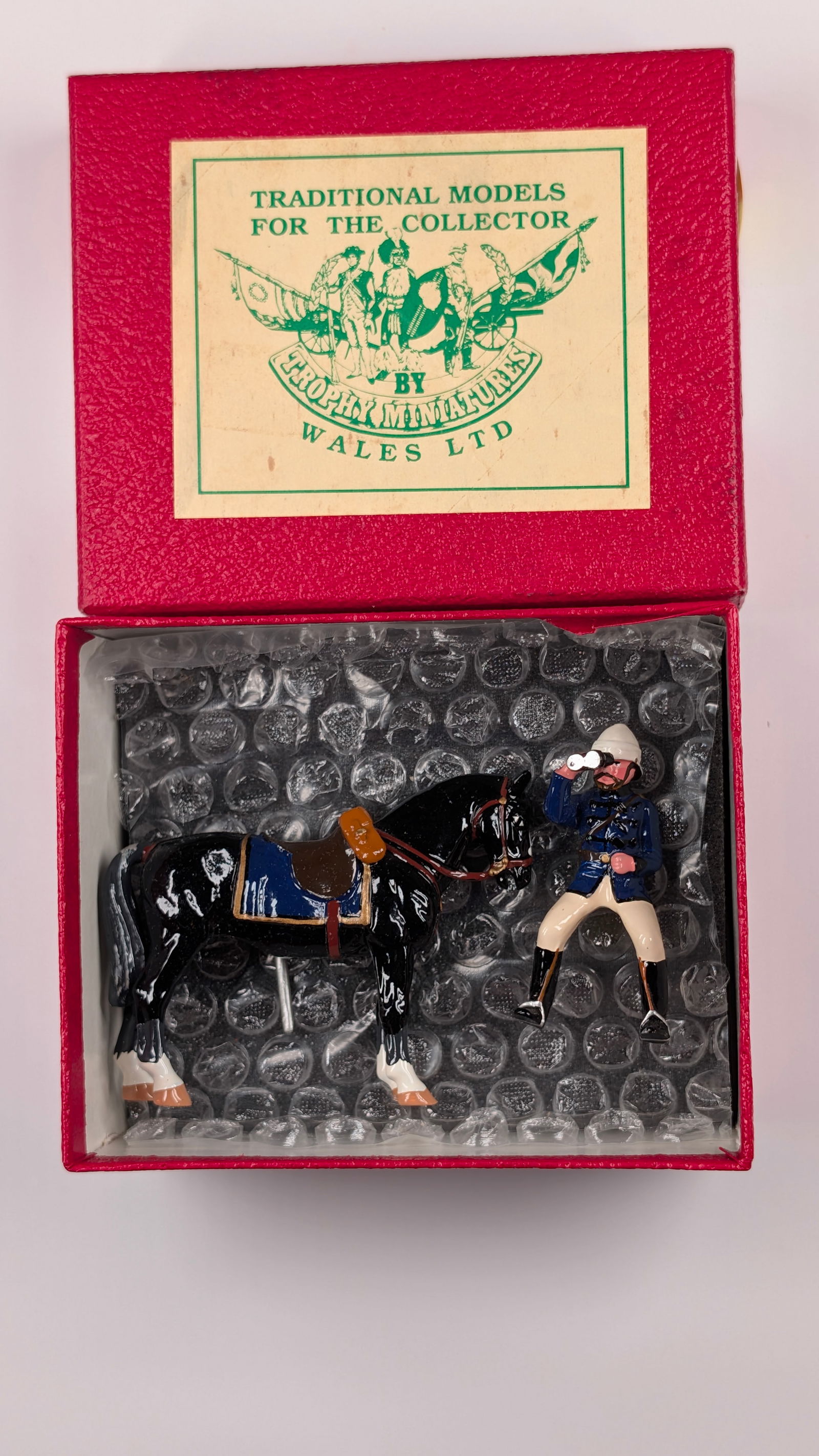 TROPHY MINIATURES MOUNTED SOLDIER W/ BINOCULARS: REMAINS IN VERY GOOD CONDITION WITH BOX.