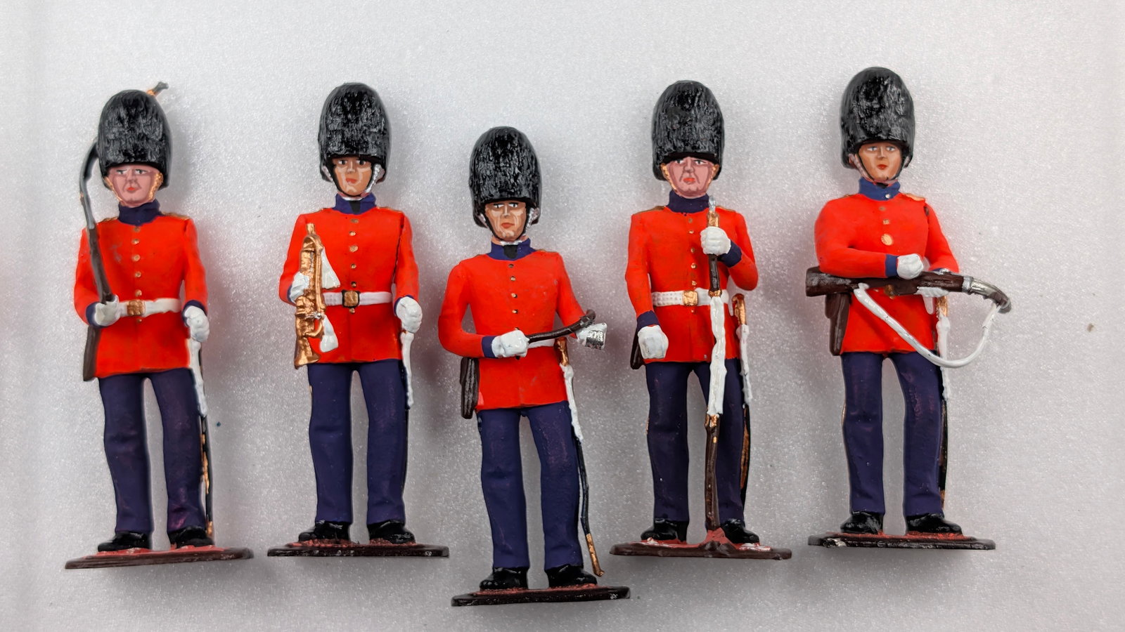 SET OF 5 UNMARKED HAND PAINTED SOLDIERS: ALL REMAIN IN FAIR TO GOOD CONDITION, SHOWING SOME TYPICAL WEAR WITH BENDS IN METAL