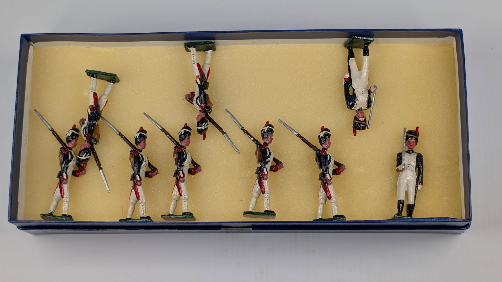 SET OF 9 HAND PAINTED LEAD SOLDIERS: ALL REMAIN IN FAIR TO GOOD CONDITION, SHOWING SOME TYPICAL WEAR. CUSTOM BOX.