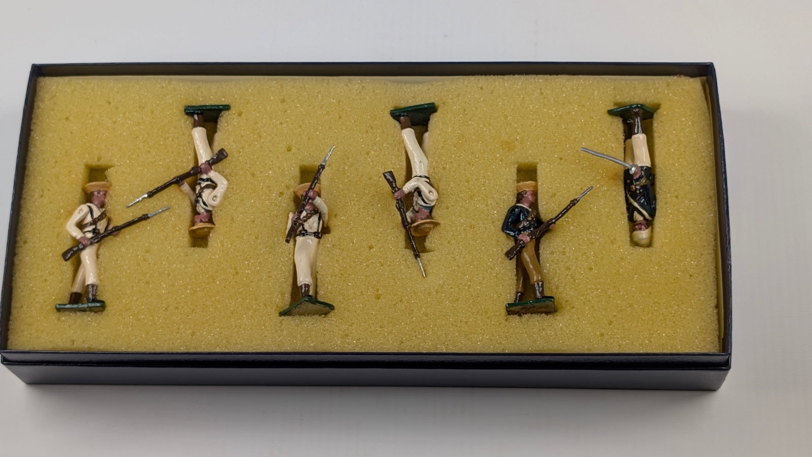 SET OF 6 HAND PAINTED SOLDIERS W/ OFFICER: ALL REMAIN IN VERY GOOD CONDITION, SHOWING LIGHT WEAR.