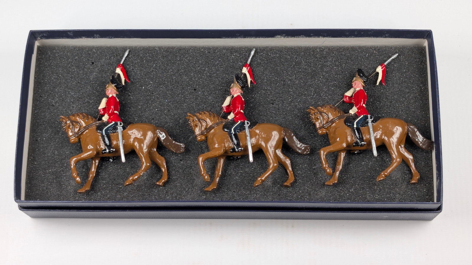 SET OF 3 HAND PAINTED MOUNTED LANCERS: ALL REMAIN IN GOOD CONDITION, SHOWING SOME TYPICAL WEAR.