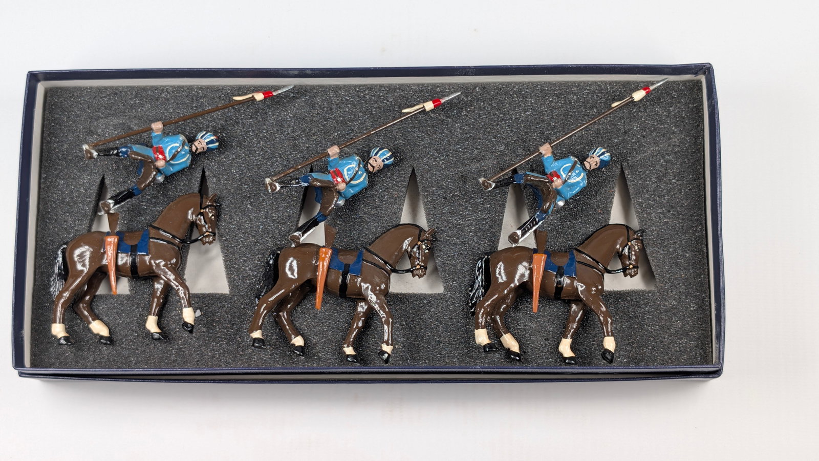 SET OF 3 HAND PAINTED MOUNTED LANCERS: ALL REMAIN IN GOOD CONDITION, SHOWING SOME TYPICAL WEAR.