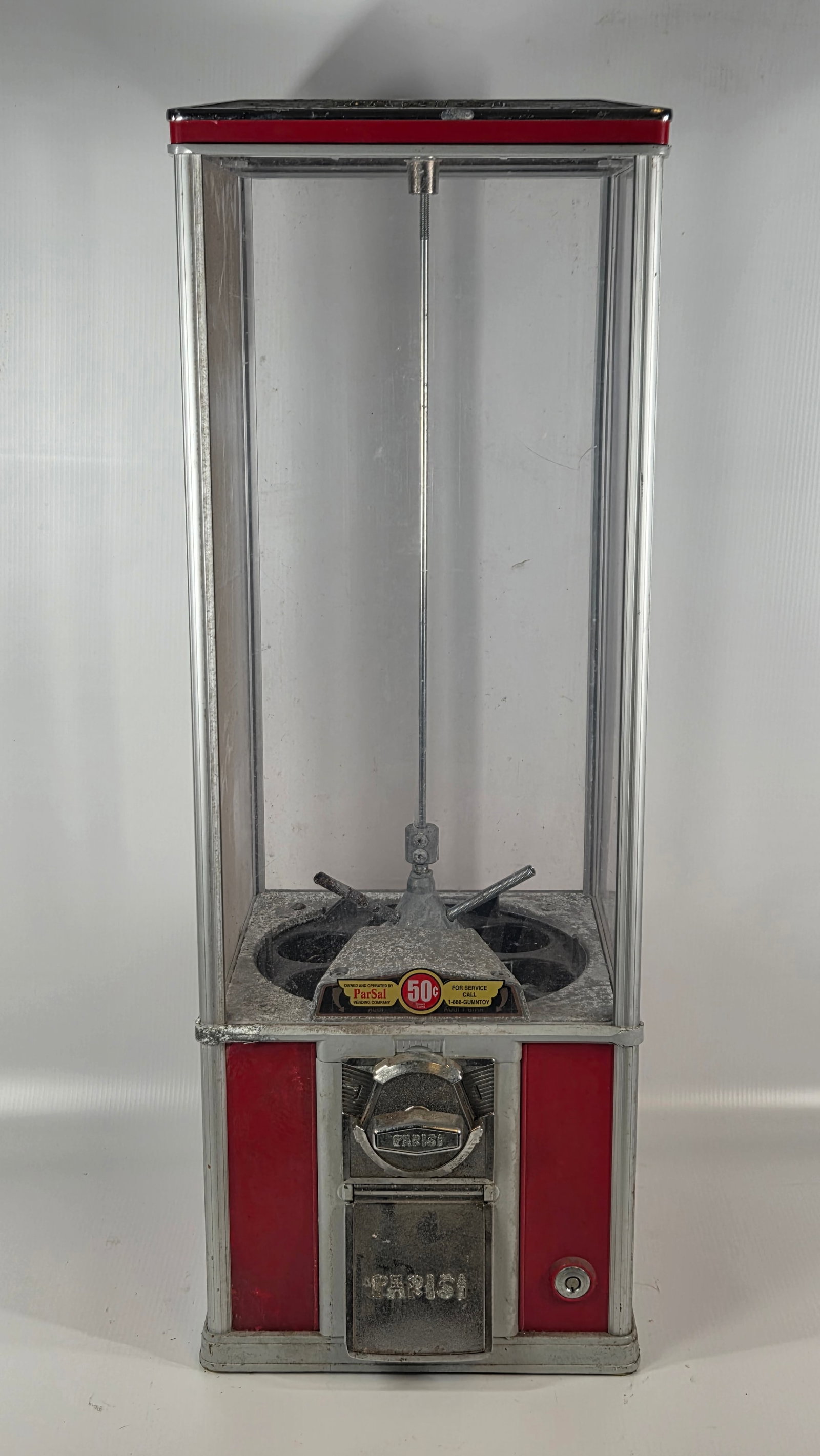 PARISI 50 CENT GUMBALL VENDING MACHINE: REMAINS IN GOOD USED CONDITION, SHOWING TYPICAL WEAR. TOP WITH PAINT STRIPPED.