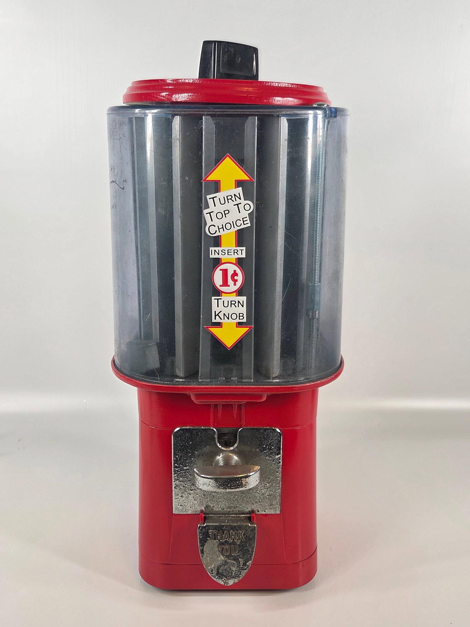 VINTAGE 1 CENT ROTATING VENDING MACHINE: REMAINS IN GOOD CONDITION, SHOWING SOME TYPICAL USAGE WEAR.