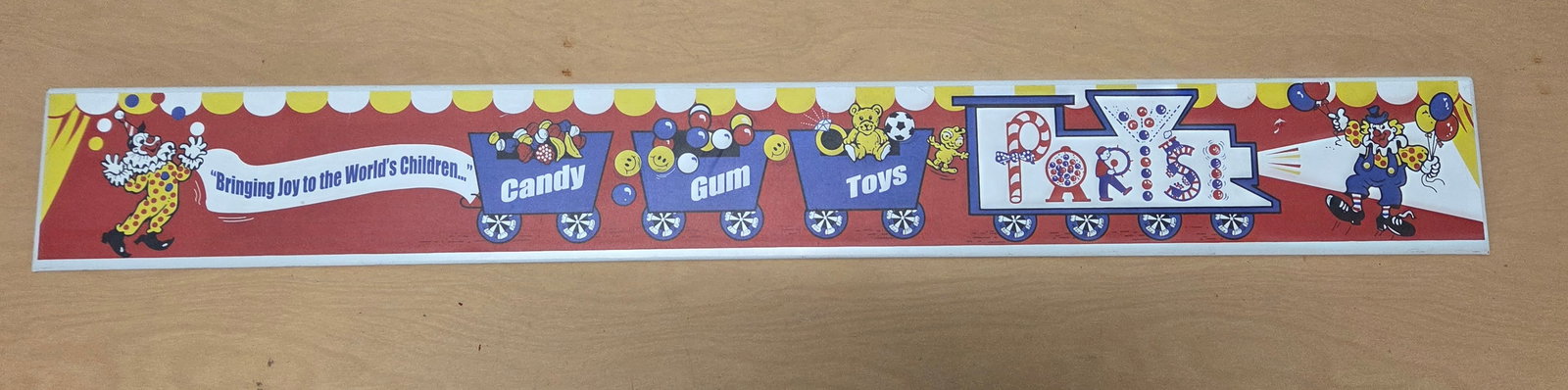 PARISI CANDY GUM TOYS METAL TRAIN SIGN: REMAINS IN VERY GOOD CONDITION, SHOWING MINIMAL WEAR.