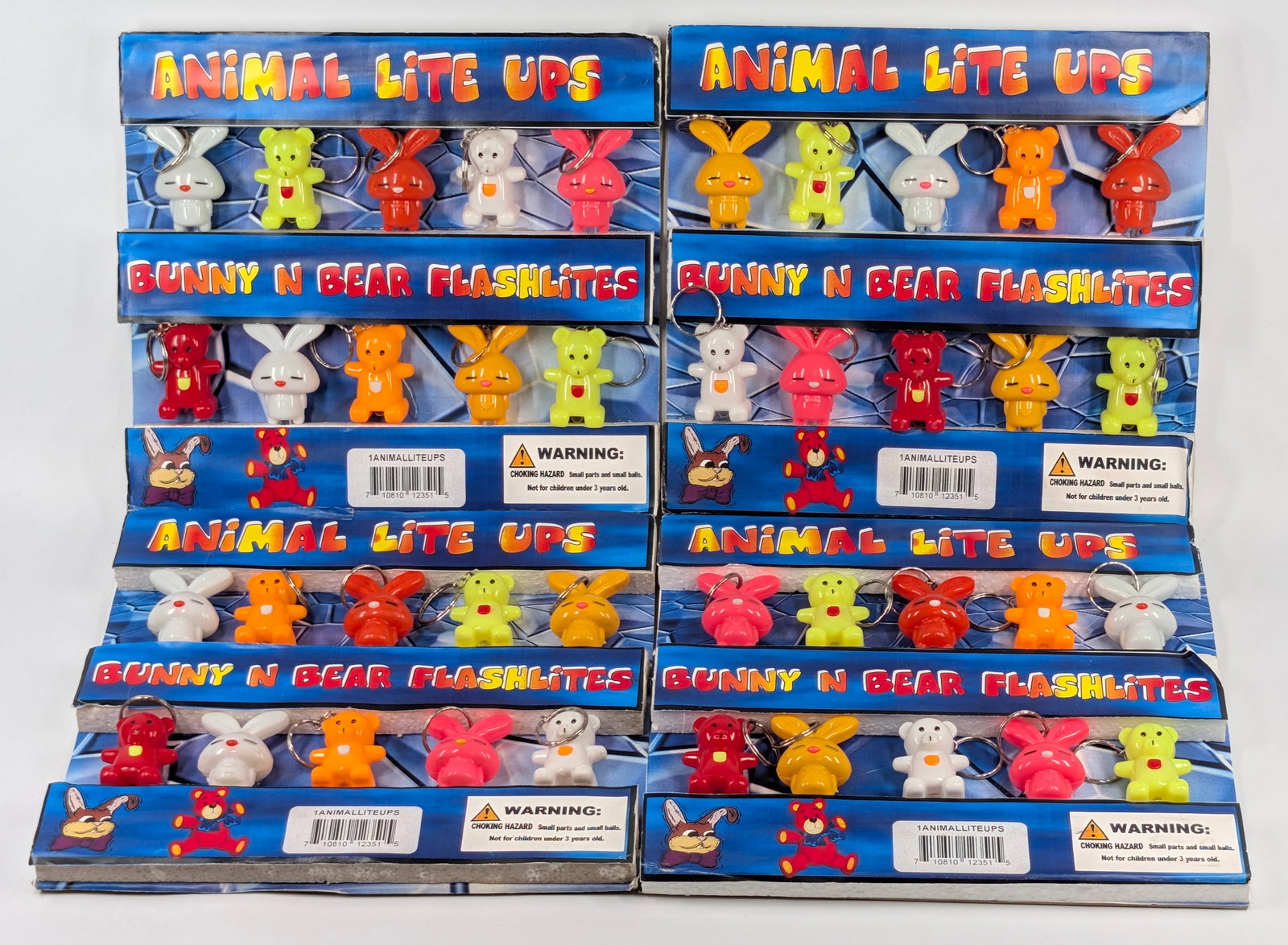4) ANIMAL LIGHT UP KEYCHAIN VENDING MACHINE INSERT SIGNS: ALL REMAIN IN GOOD CONDITION, SHOWING SOME TYPICAL WEAR.