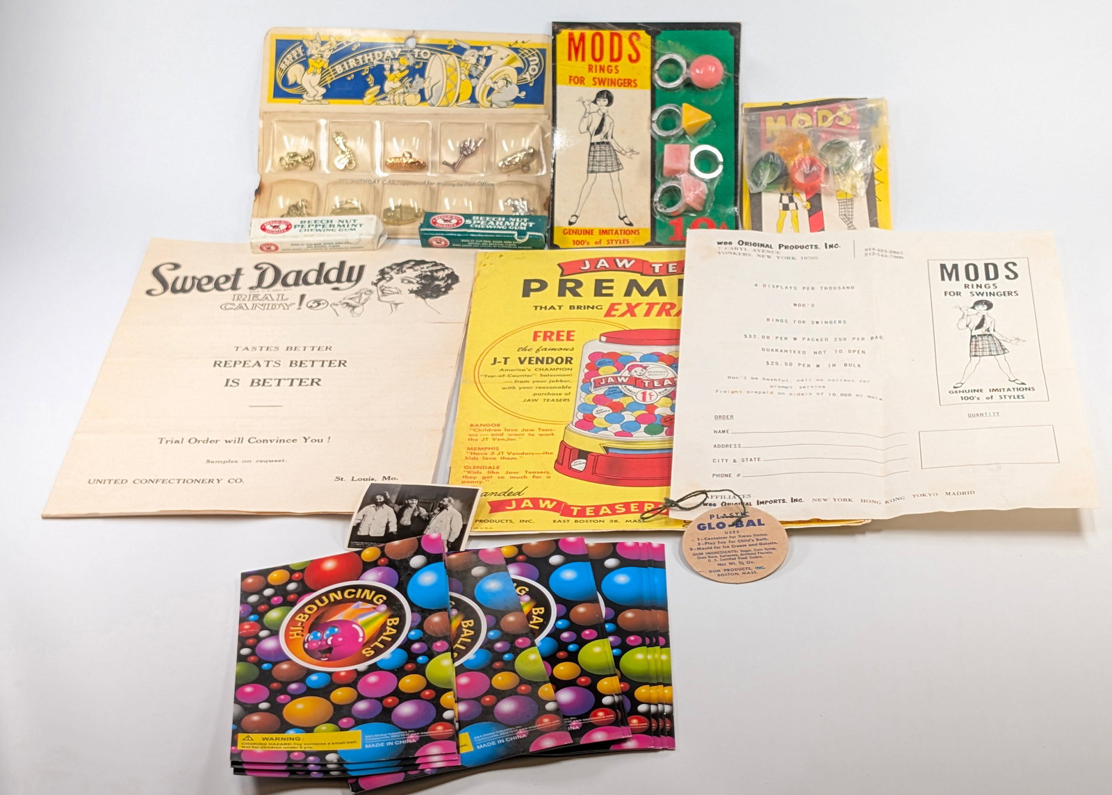 ASSORTMENT OF VARIOUS VINTAGE GUMBALL VENDING EPHEMERA: ALL REMAIN IN GOOD CONDITION, SHOWING SOME TYPICAL WEAR.