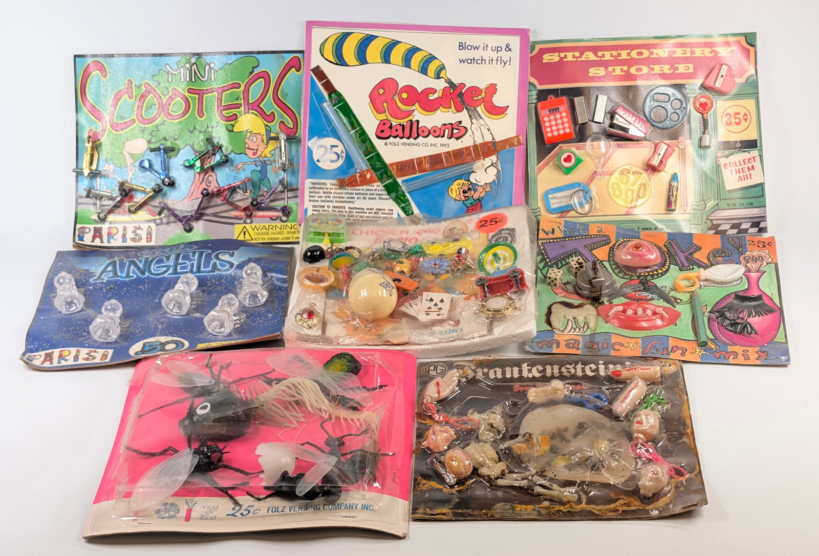 8) VENDING MACHINE DISPLAY INSERTS: ALL REMAIN IN GOOD CONDITION.