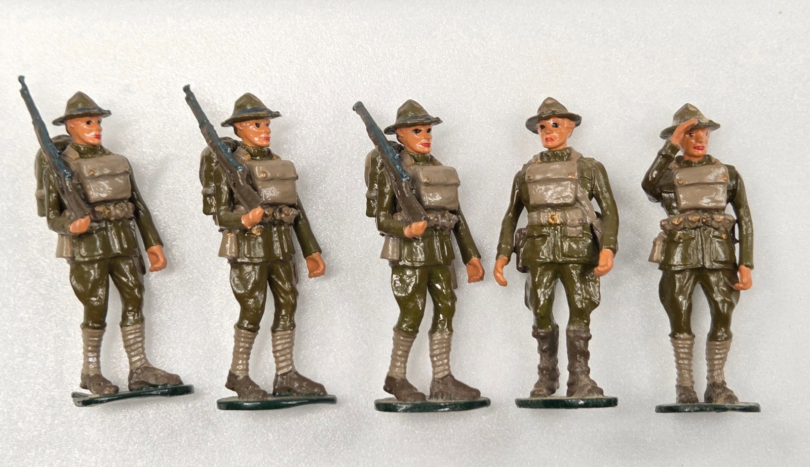 SET OF 5 HAND PAINTED 1979 "DJ" LEAD SOLDIERS: ALL REMAIN IN GOOD CONDITION, SHOWING SOME TYPICAL WEAR.