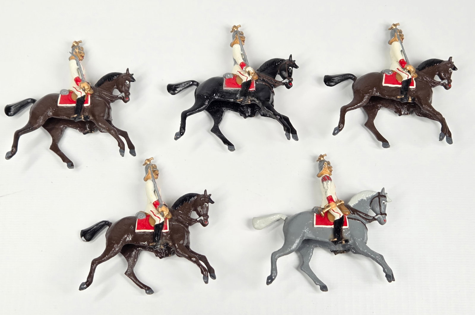 5) UNMARKED LIFEGUARDS ON HORSEBACK: ALL REMAIN IN GOOD CONDITION, SHOWING SOME TYPICAL WEAR.