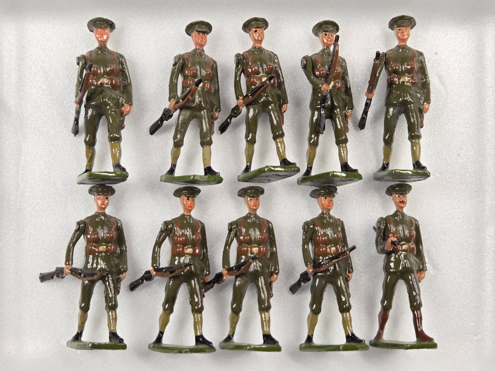 SET OF 10 UNMARKED HAND PAINTED LEAD SOLDIERS: ALL REMAIN IN GOOD CONDITION, SHOWING SOME TYPICAL WEAR.
