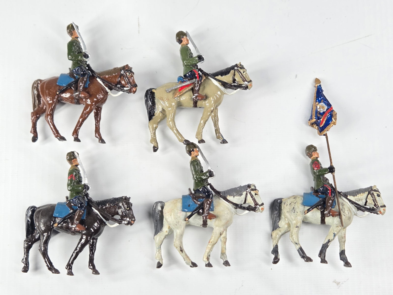 5) UNMARKED HAND PAINTED MOUNTED SOLDIERS: ALL REMAIN IN FAIR TO GOOD CONDITION, SHOWING SOME PAINT WEAR.