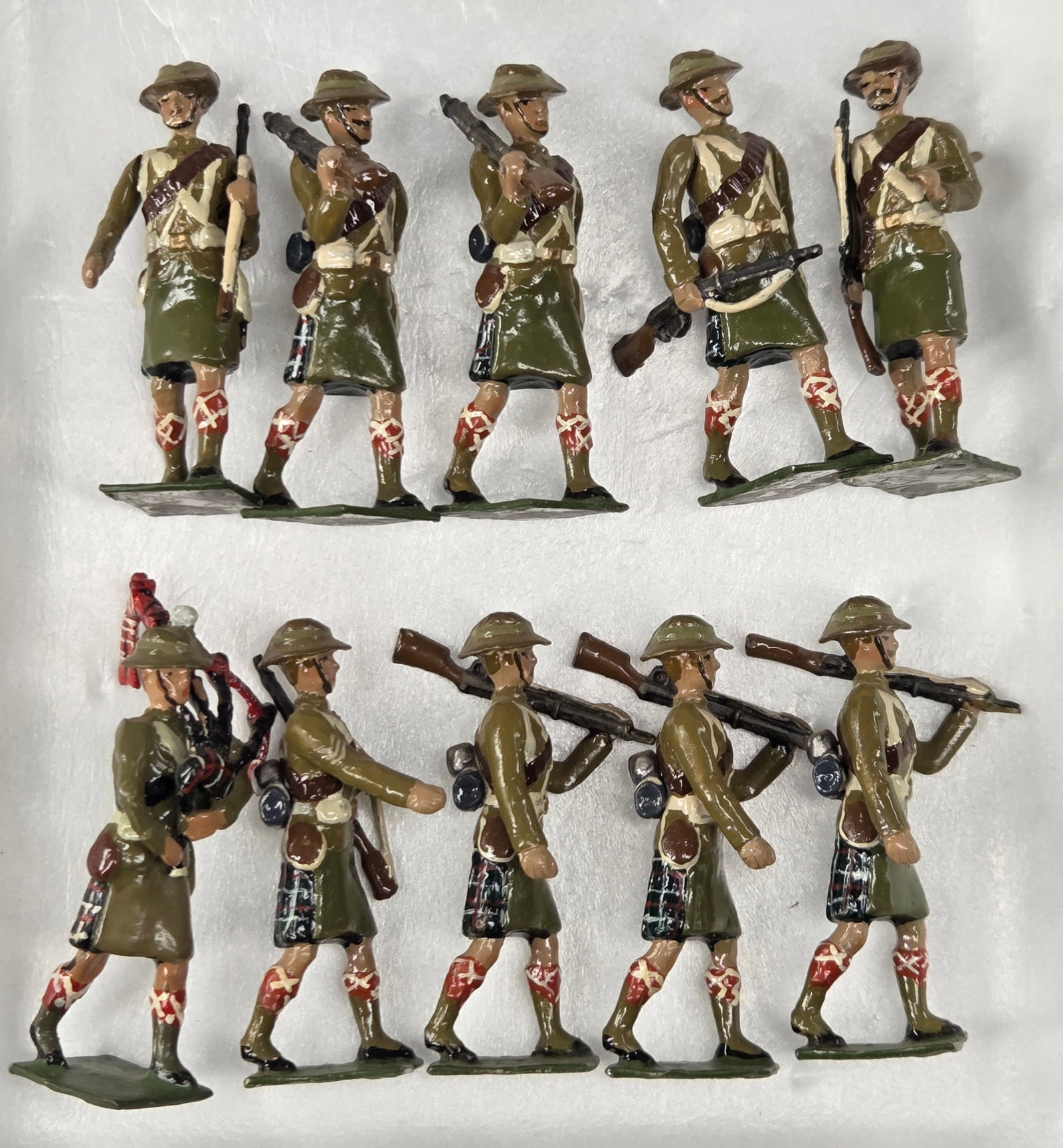 10) UNMARKED HAND PAINTED HIGHLANDERS: ALL REMAIN IN GOOD CONDITION, SHOWING SOME TYPICAL WEAR.