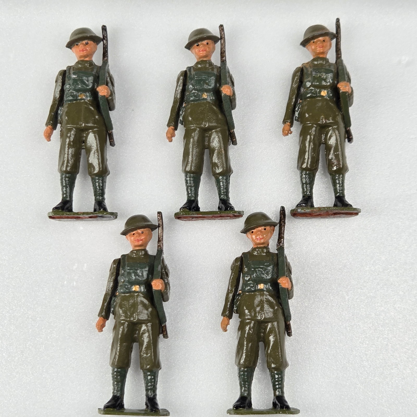 5) UNMARKED WWI DOUGHBOY SOLDIERS: ALL REMAIN IN GOOD CONDITION, SHOWING SOME TYPICAL WEAR.