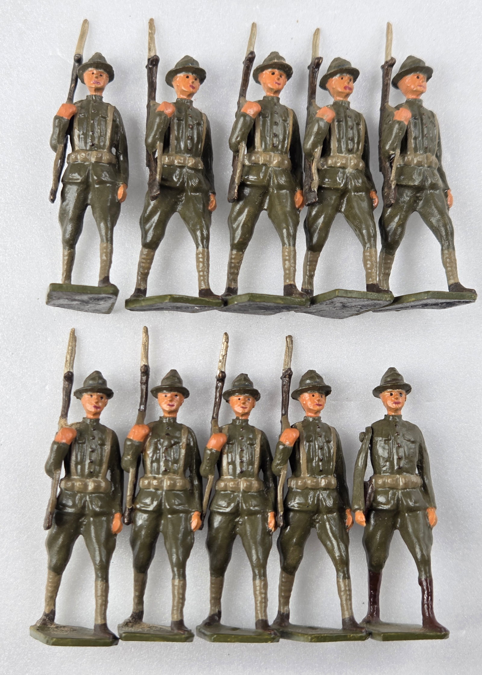 10) UNMARKED HAND PAINTED LEAD SOLDIERS: ALL REMAIN IN GOOD CONDITION, SHOWING SOME TYPICAL WEAR.