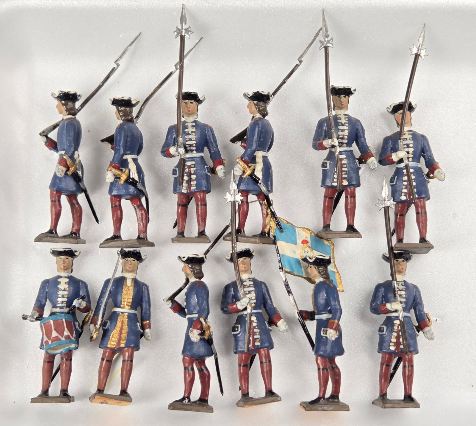 SET OF 12 UNMARKED SOLDIERS OF ARMY OF LOUIS XIV: ALL REMAIN IN FAIR TO GOOD CONDITION, SHOWING SOME TYPICAL WEAR.