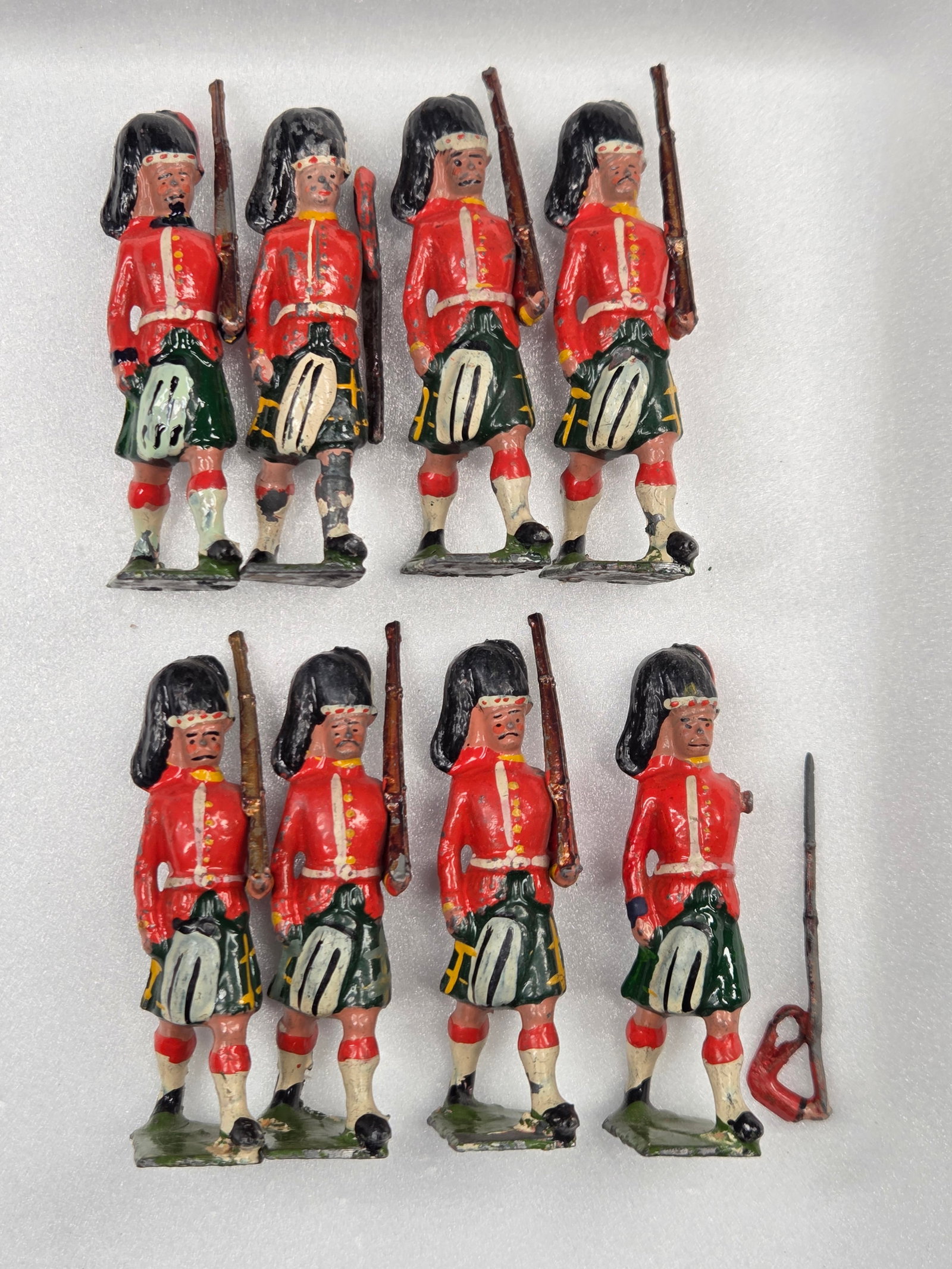 8) BRITAIN HIGHLANDERS: ALL REMAIN IN FAIR TO GOOD CONDITION, SHOWING SOME PAINT WEAR AND SOME LOOSE ARMS.