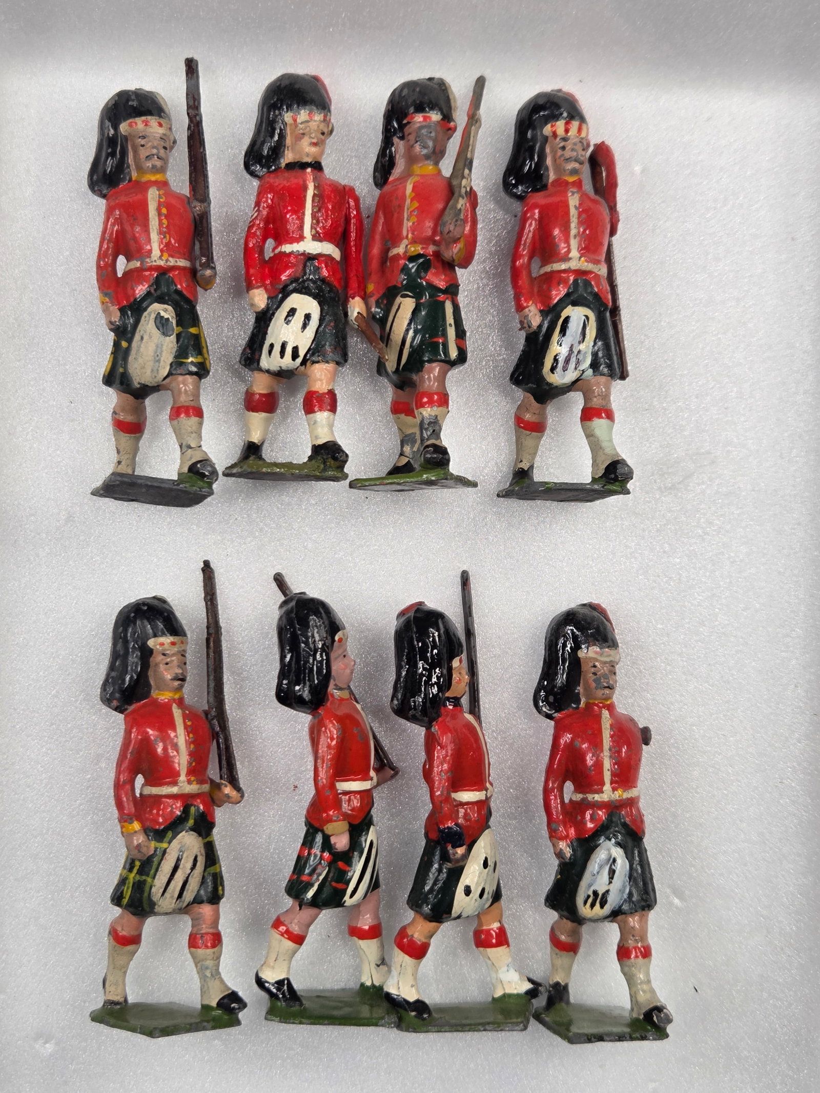 8) BRITAIN HIGHLANDERS: ALL REMAIN IN FAIR TO GOOD CONDITION, SHOWING SOME PAINT WEAR AND SOME LOOSE ARMS.