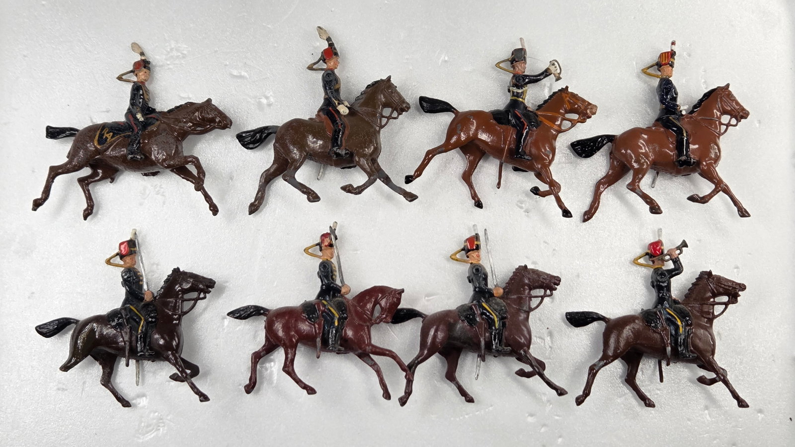 SET OF 8 VINTAGE BRITAIN 11TH HUSSARS MOUNTED: ALL REMAIN IN FAIR TO GOOD CONDITION, SHOWING SOME PAINT WEAR AND SOME LOOSE ARMS.