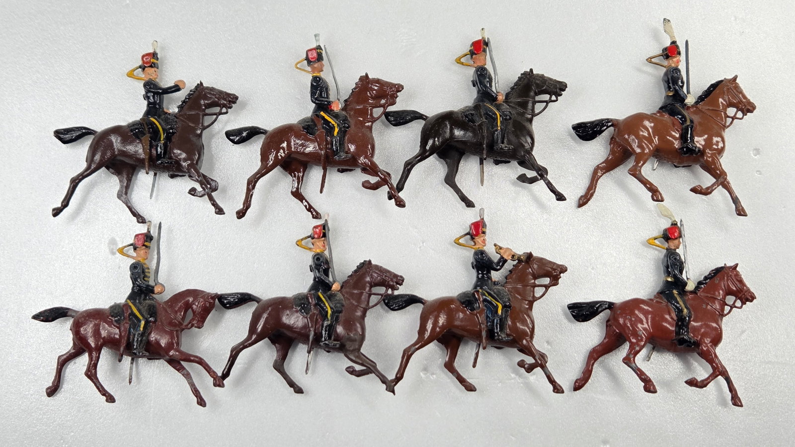 SET OF 8 VINTAGE BRITAIN 11TH HUSSARS MOUNTED: ALL REMAIN IN FAIR TO GOOD CONDITION, SHOWING SOME PAINT WEAR AND SOME LOOSE ARMS.