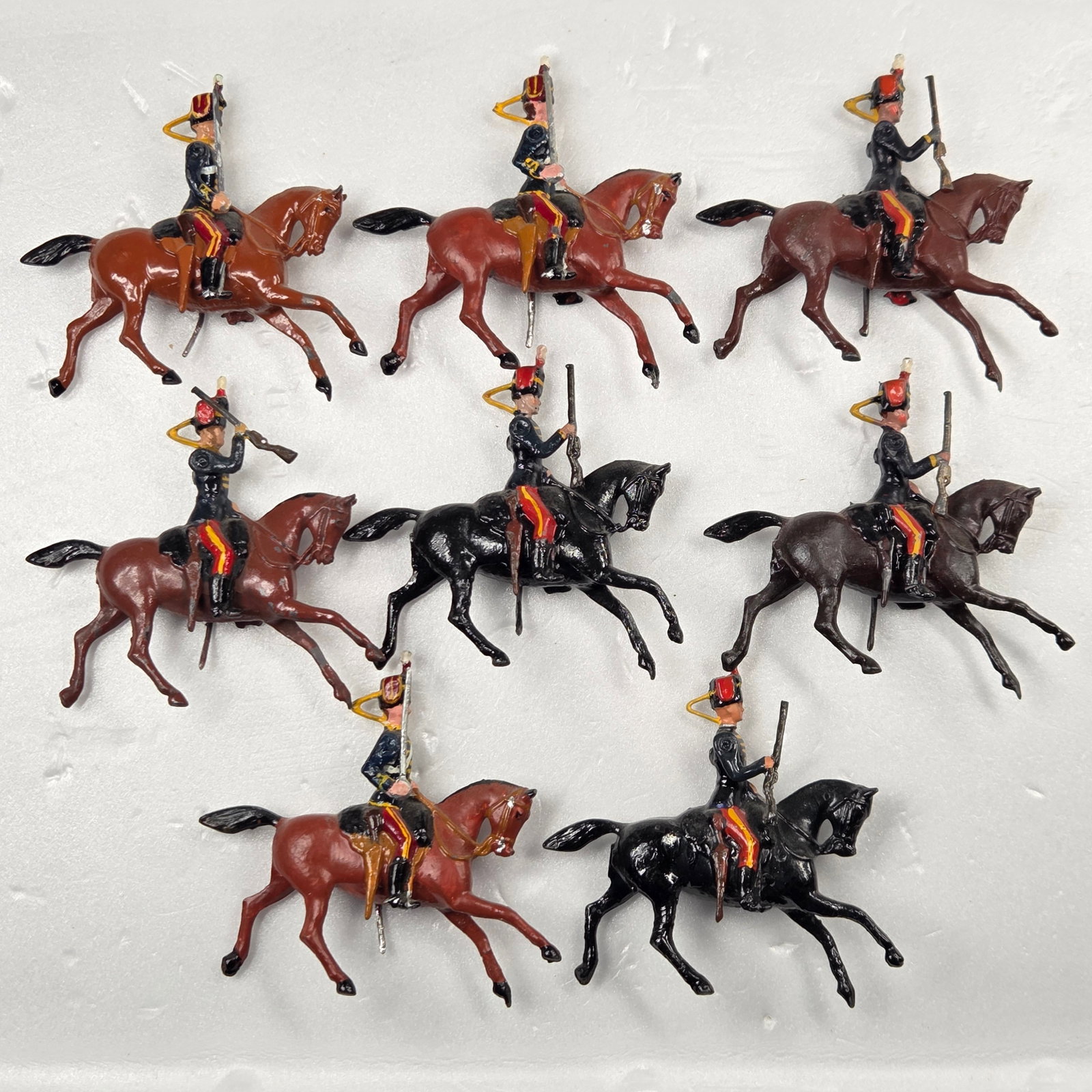 SET OF 8 VINTAGE BRITAIN 11TH HUSSARS MOUNTED: ALL REMAIN IN FAIR TO GOOD CONDITION, SHOWING SOME PAINT WEAR AND SOME LOOSE ARMS.