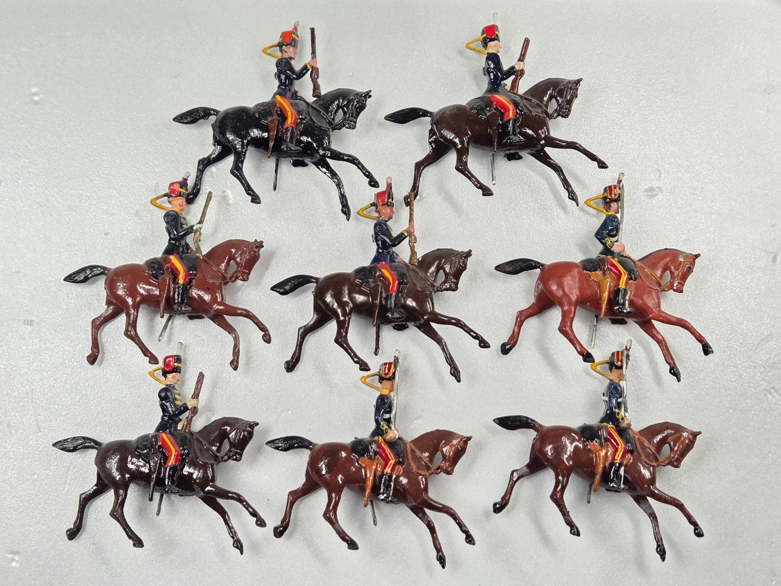 SET OF 8 VINTAGE BRITAIN 11TH HUSSARS MOUNTED: ALL REMAIN IN FAIR TO GOOD CONDITION, SHOWING SOME PAINT WEAR AND SOME LOOSE ARMS.