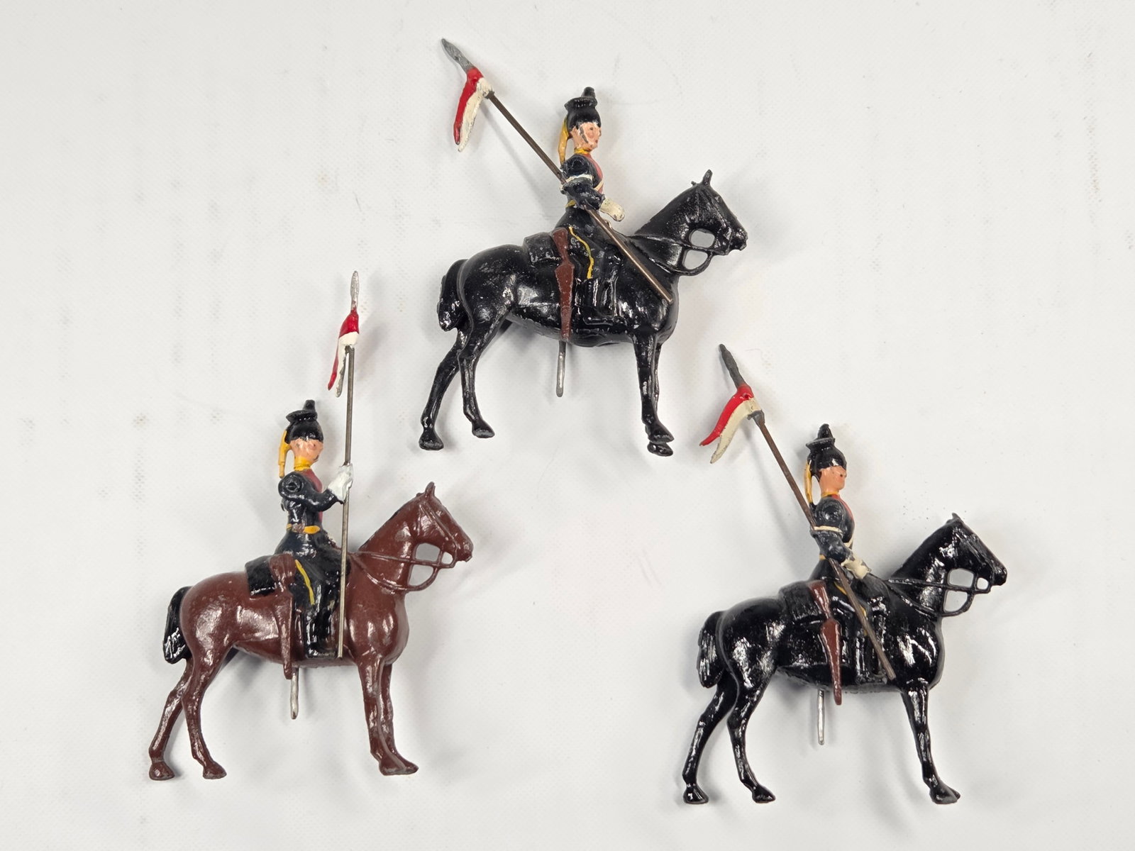 SET OF 3 VINTAGE BRITAIN 11TH HUSSARS MOUNTED: ALL REMAIN IN FAIR TO GOOD CONDITION, SHOWING SOME PAINT WEAR AND SOME LOOSE ARMS.