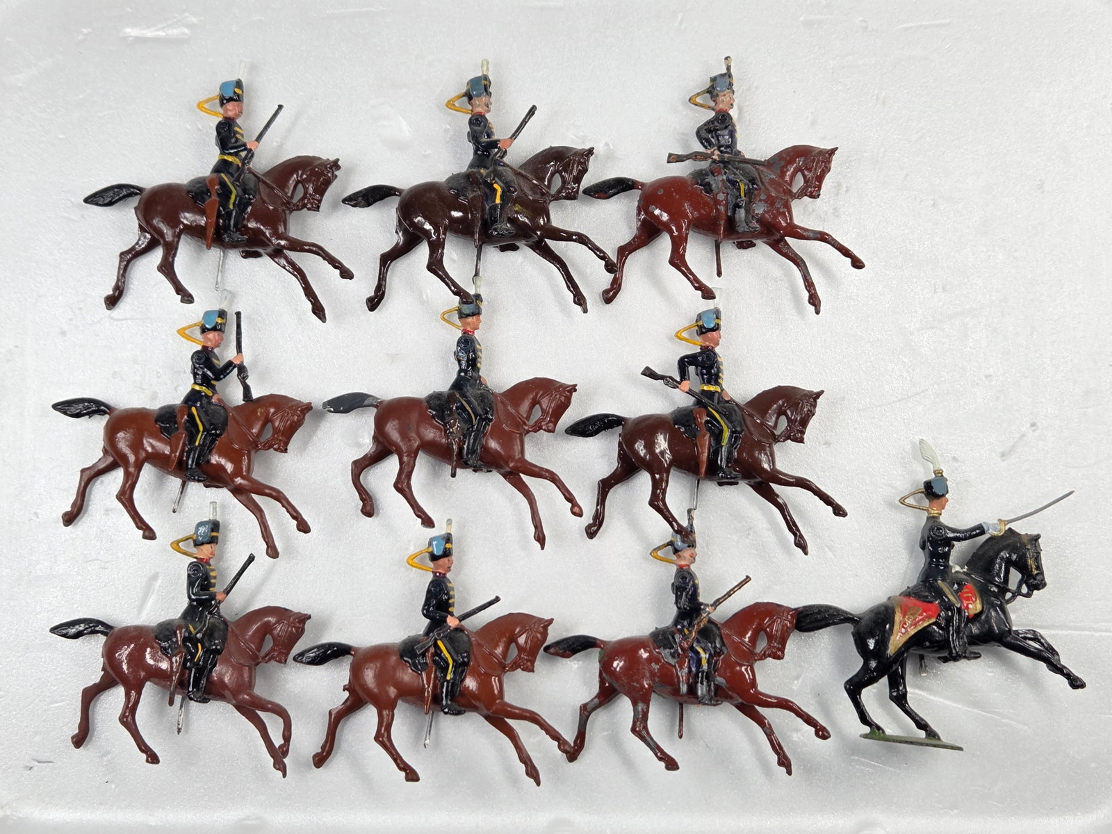 SET OF 10 VINTAGE BRITAIN 11TH HUSSARS MOUNTED: ALL REMAIN IN FAIR TO GOOD CONDITION, SHOWING SOME PAINT WEAR AND SOME LOOSE ARMS.