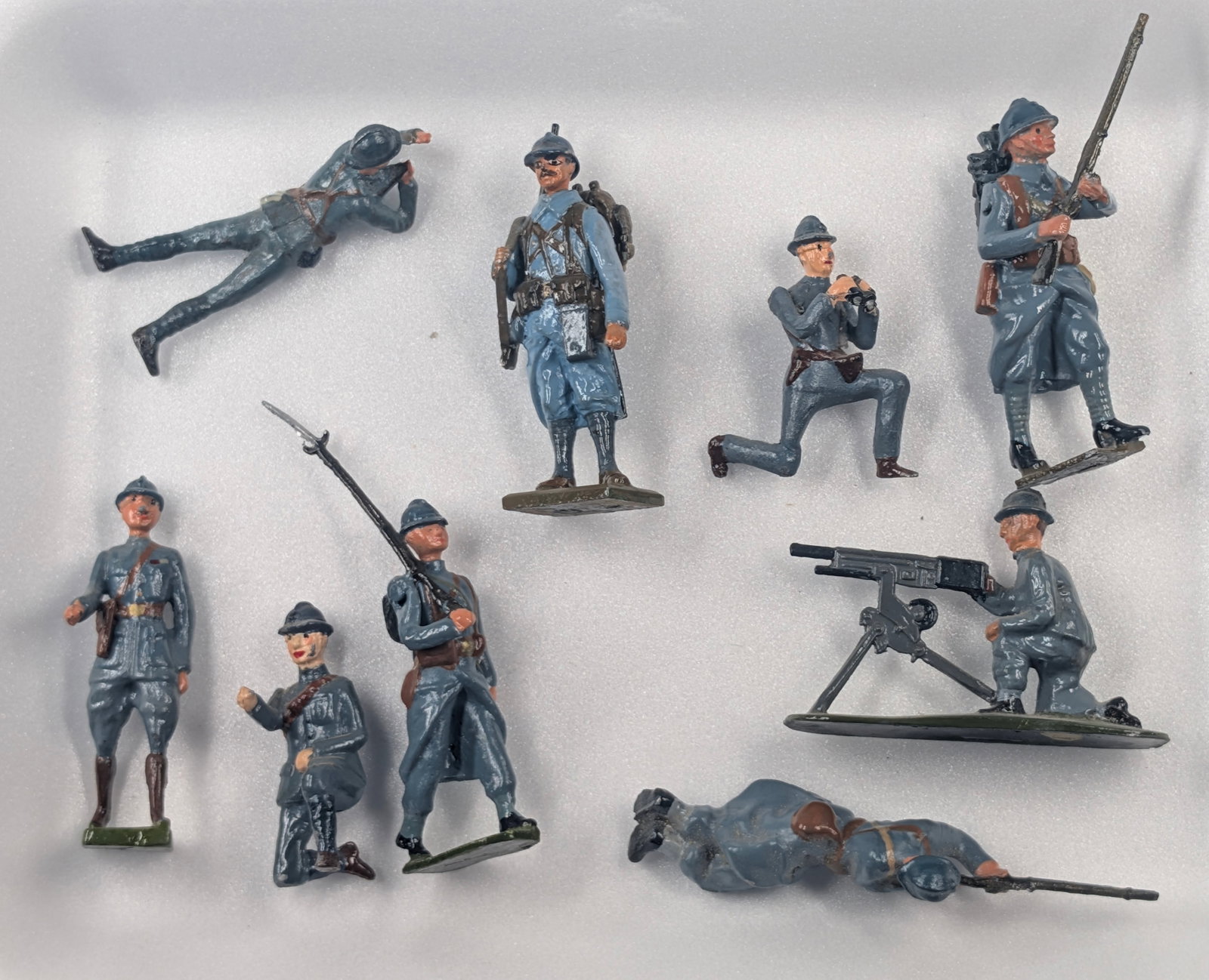 9) VARIOUS BRAND HAND PAINTED LEAD SOLDIERS: ALL REMAIN IN FAIR TO GOOD CONDITION, SHOWING TYPICAL WEAR. ONE SOLDIER WITH BROKEN MISSING RIFLE.