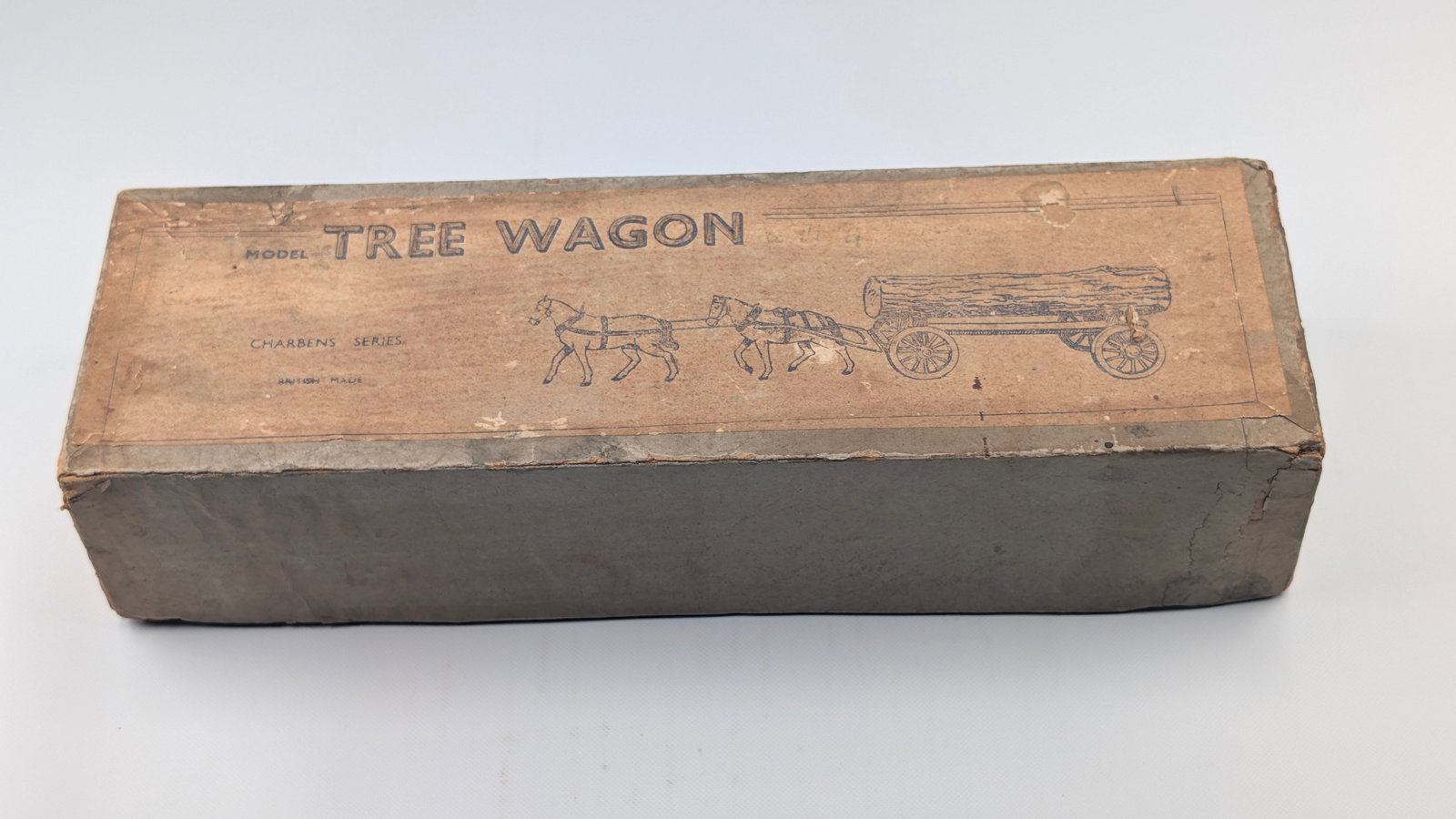 EARLY BRITAIN CHARBENS SERIES TREE WAGON W/ BOX: REMAINS IN FAIR TO GOOD CONDITION, SHOWING SOME TYPICAL PAINT WEAR. ORIGINAL BOX INCLUDED REMAINS IN OVERALL FAIR TO GOOD CONDITION, SHOWING SOME TYPICAL STORAGE WEAR.