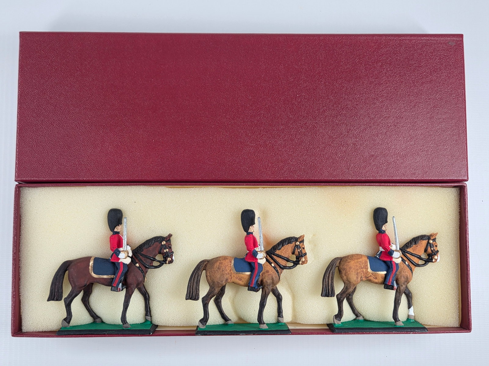 AMBASSADOR 3-PIECE MOUNTED SCOTS GUARDS: ALL REMAIN IN GOOD CONDITION WITH CUSTOM BOX.