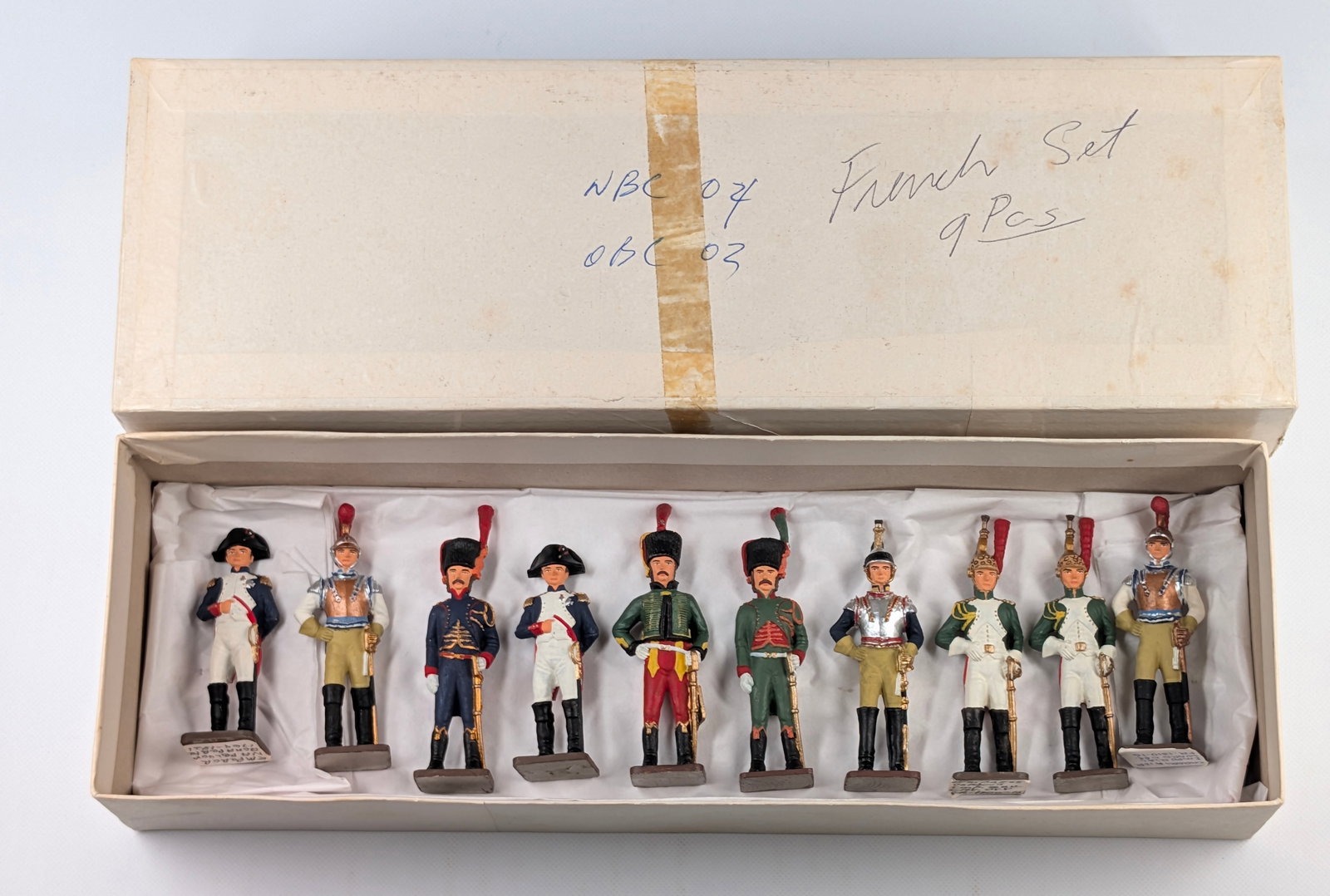 9-PIECE HAND PAINTED FRENCH NAPOLEONIC SOLDIERS: ALL REMAIN IN VERY GOOD CONDITION, SHOWING SOME LIGHT WEAR.